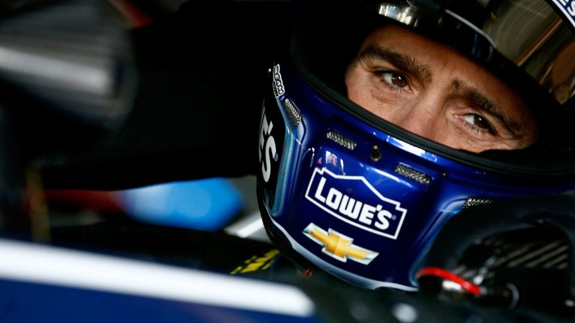 DOVER, DE - MAY 14: Jimmie Johnson, driver of the #48 Lowe's Chevrolet, sits in his car during practice for the NASCAR Sprint Cup Series AAA Drive For Autism at Dover International Speedway on May 14, 2016 in Dover, Delaware. (Photo by Jeff Zelevansky/NASCAR via Getty Images)