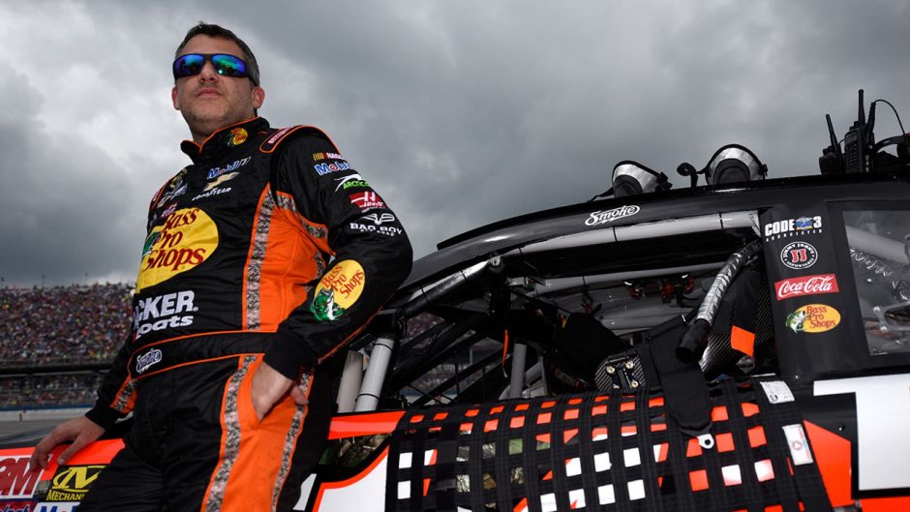 TALLADEGA, AL - MAY 01: Tony Stewart, driver of the #14 Bass Pro Shops Chevrolet, stands on the grid prior to the NASCAR Sprint Cup Series GEICO 500 at Talladega Superspeedway on May 1, 2016 in Talladega, Alabama. (Photo by Jared C. Tilton/Getty Images)