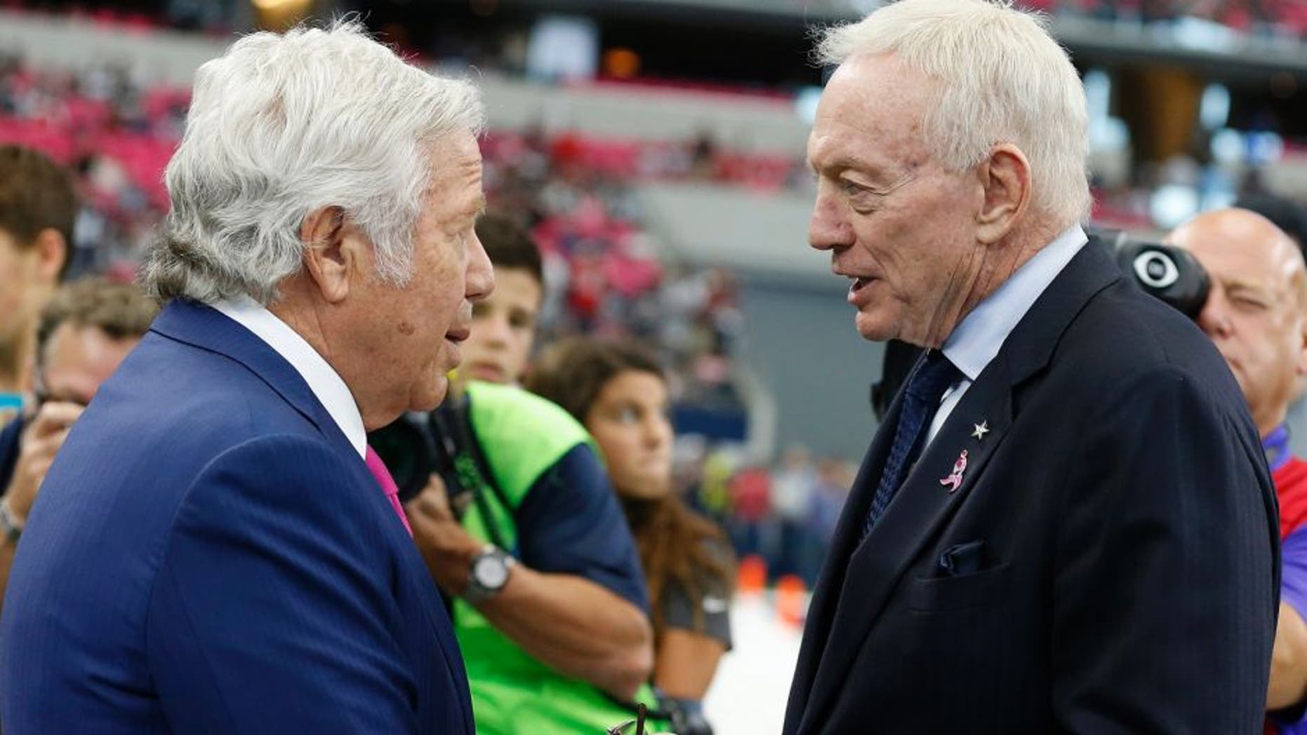 Oct 11, 2015; Arlington, TX, USA; Dallas Cowboys owner Jerry Jones talks with New England Patriots owner Robert Kraft prior to the game at AT&T Stadium. Mandatory Credit: Matthew Emmons-USA TODAY Sports