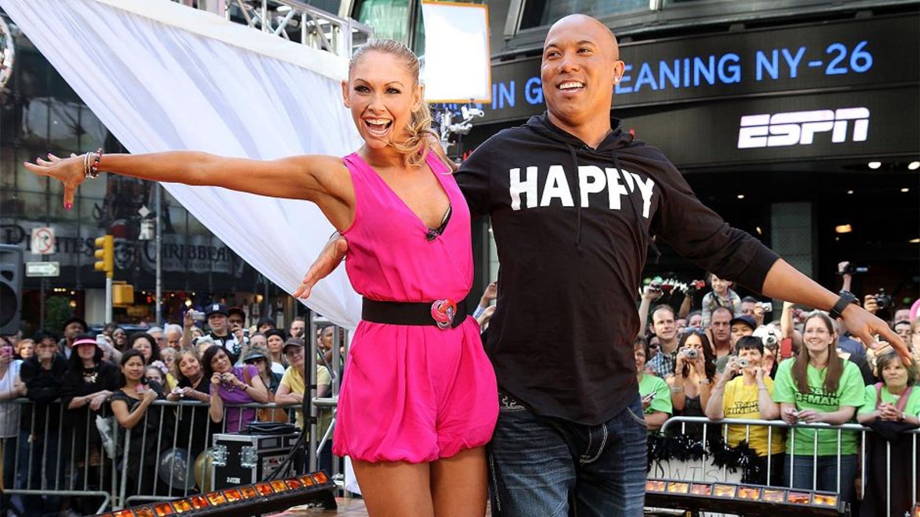 NEW YORK, NY - MAY 25: Dancing with the Stars champions Kym Johnson and Hines Ward perform during ABC's "Good Morning America" on Military Island in Times Square on May 25, 2011 in New York City. (Photo by Taylor Hill/Getty Images)