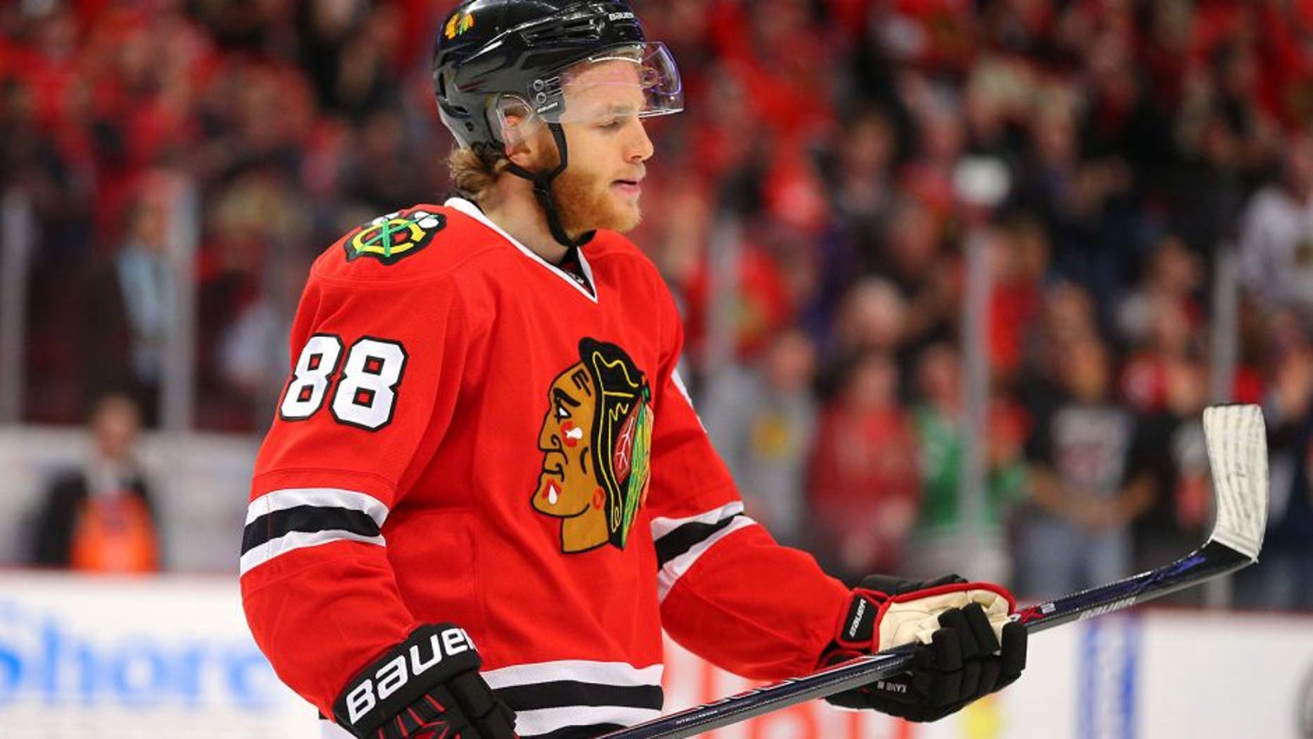 May 21, 2015; Chicago, IL, USA; Chicago Blackhawks right wing Patrick Kane (88) celebrates after scoring in the first period in game three of the Western Conference Final of the 2015 Stanley Cup Playoffs against the Anaheim Ducks at United Center. Mandatory Credit: Dennis Wierzbicki-USA TODAY Sports