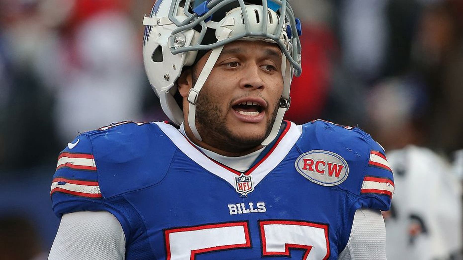 ORCHARD PARK, NY - NOVEMBER 9: Ty Powell #57 of the Buffalo Bills during NFL game action against the Kansas City Chiefs at Ralph Wilson Stadium on November 9, 2014 in Orchard Park, New York. (Photo by Tom Szczerbowski/Getty Images)