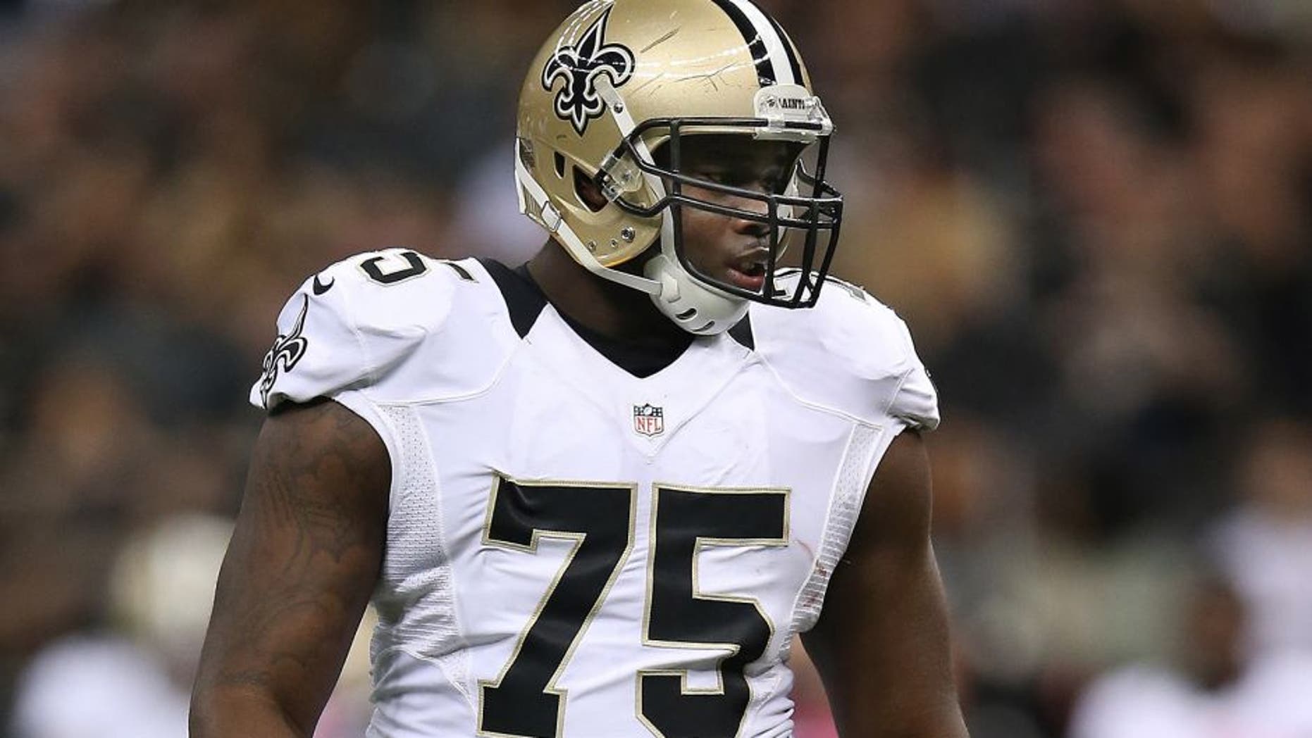 NEW ORLEANS, LA - OCTOBER 05: Tyrunn Walker #75 of the New Orleans Saints against the Tampa Bay Buccaneers at the Mercedes-Benz Superdome on October 5, 2014 in New Orleans, Louisiana. (Photo by Chris Graythen/Getty Images)