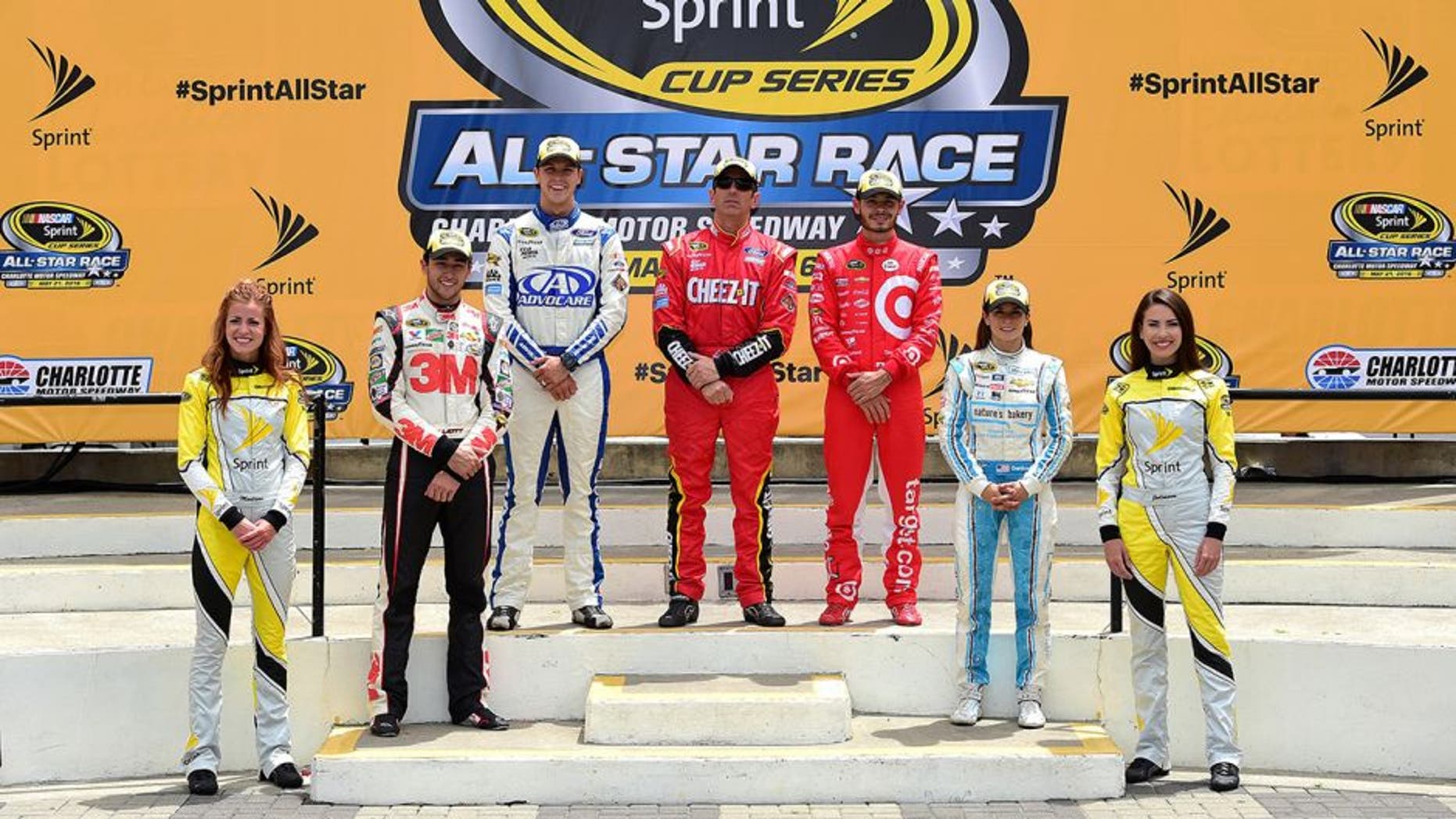 CHARLOTTE, NC - MAY 21: (Top row L-R) The segment winners, Trevor Bayne, driver of the #6 AdvoCare Ford, Greg Biffle, driver of the #16 Cheez-It Ford, and Kyle Larson, driver of the #42 Target Chevrolet, pose with the fan vote winners Chase Elliott, driver of the #24 3M Chevrolet, and Danica Patrick, driver of the #10 Nature's Bakery Chevrolet, in Victory Lane after the NASCAR Sprint Cup Series Sprint Showdown at Charlotte Motor Speedway on May 21, 2016 in Charlotte, North Carolina. (Photo by Jared C. Tilton/Getty Images)