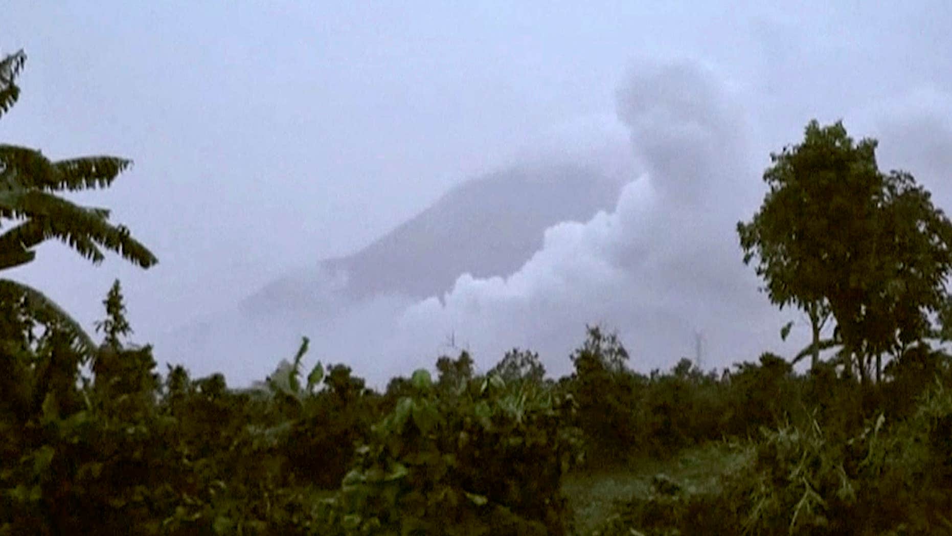 May 21, 2016: In this image made from video, hot clouds of ash rise from Mount Sinabung, in Tanah Karo, North Sumatra, Indonesia.