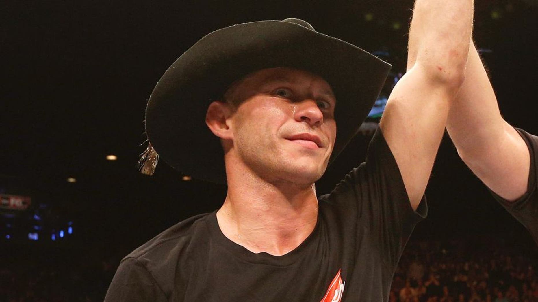 LAS VEGAS, NV - JANUARY 03: Donald Cerrone celebrates his victory over Myles Jury in their lightweight bout during the UFC 182 event on at the MGM Grand Garden Arena January 3, 2015 in Las Vegas, Nevada. (Photo by Josh Hedges/Zuffa LLC/Zuffa LLC via Getty Images)