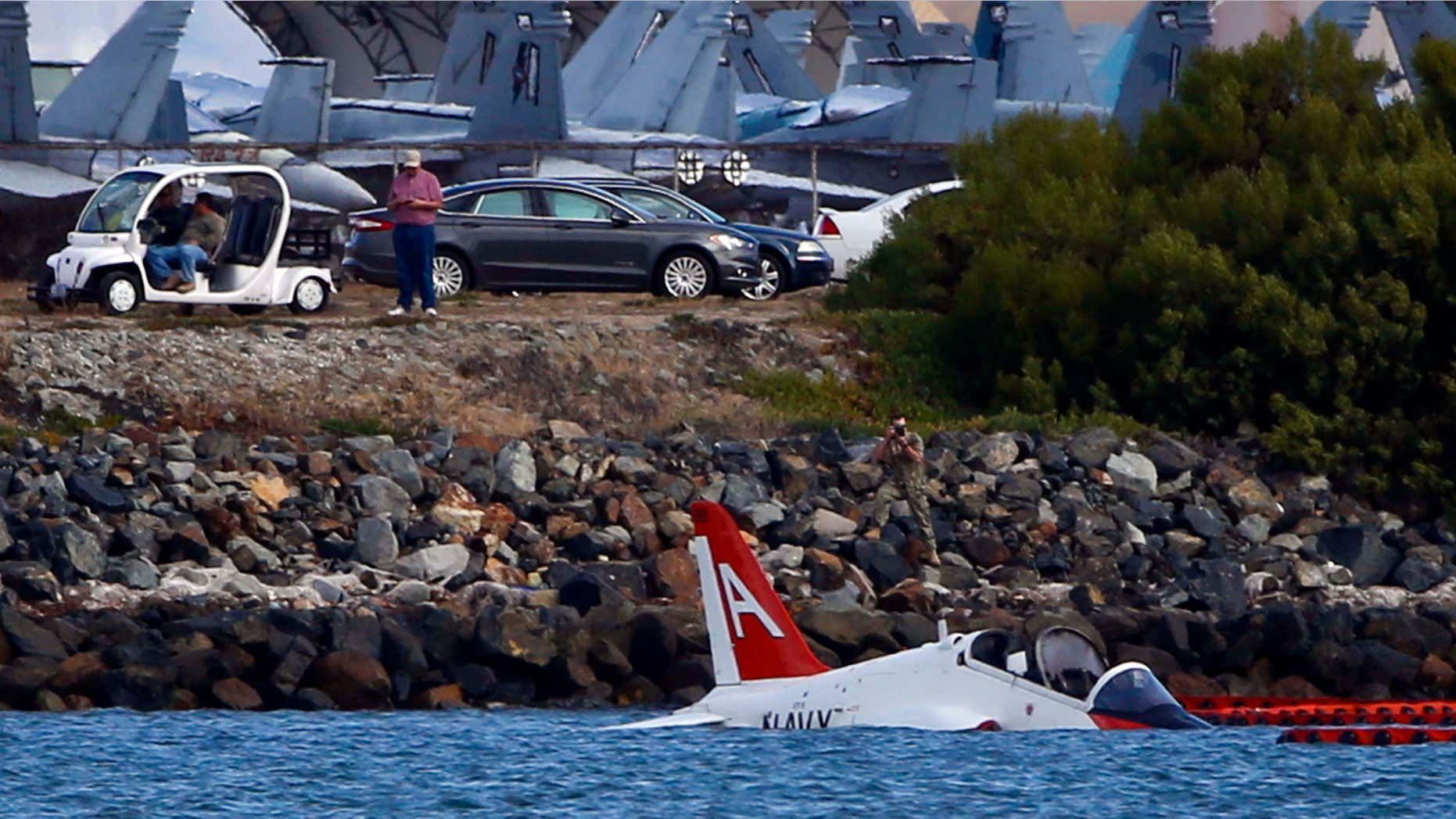 May 22, 2015: A US Navy aircraft sits in shallow water in San Diego Bay after over shooting a runway at the North Island Naval Station.