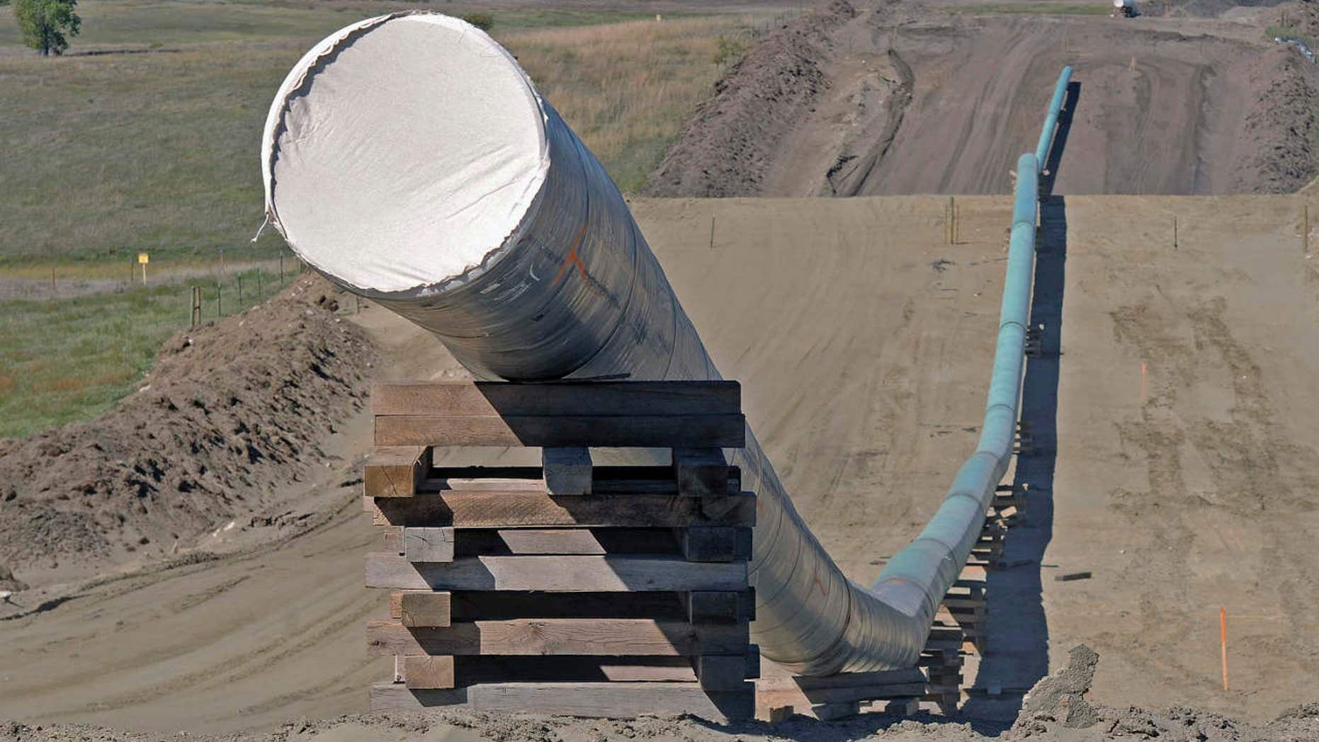 FILE - This Sept. 29, 2016, file photo, shows a section of the Dakota Access pipeline under construction near St. Anthony in Morton County, N.D