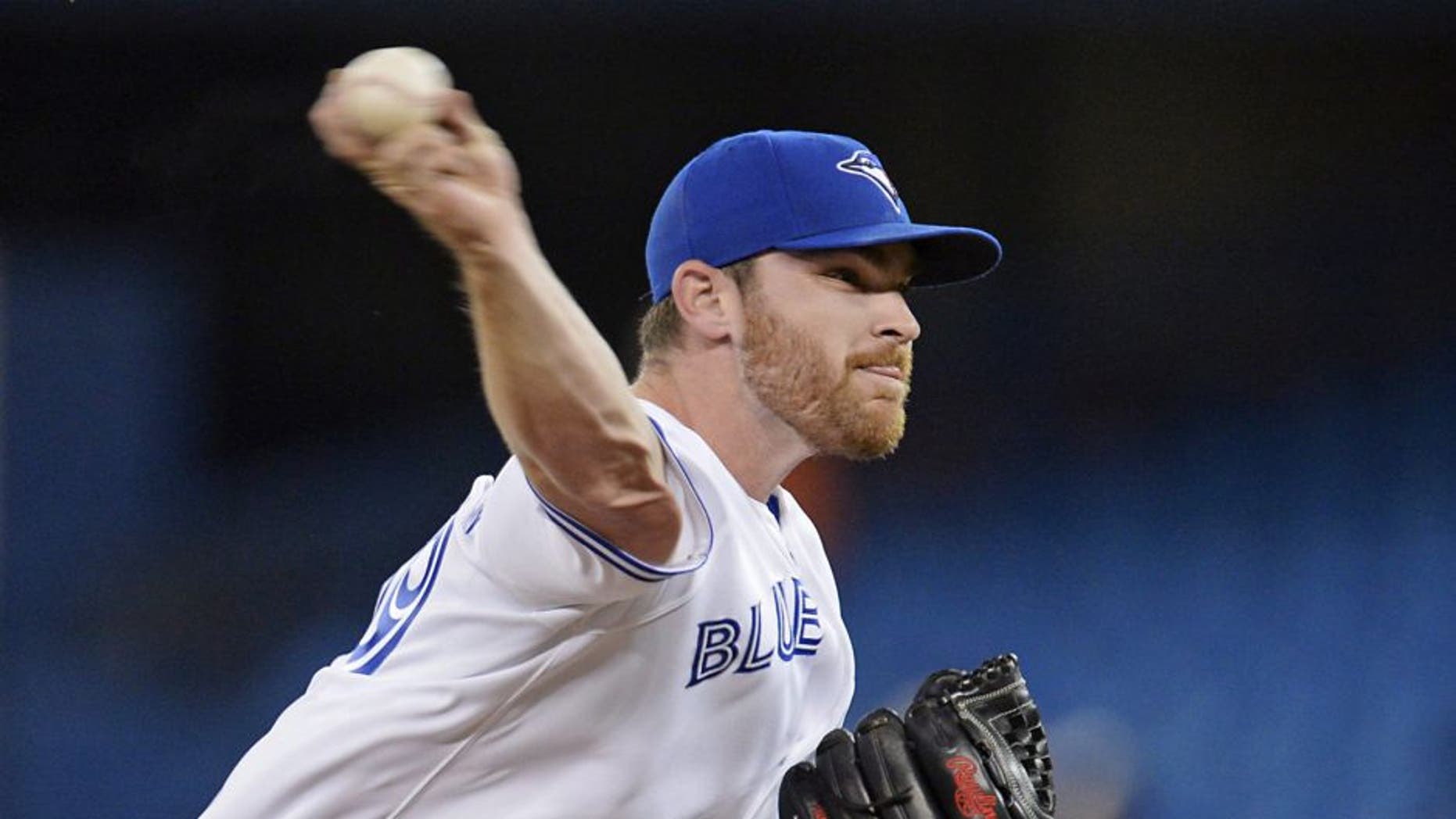 Toronto Blue Jays starting pitcher Liam Hendriks throws against the Oakland Athletics during the first inning of a baseball game Friday, May 23, 2014, in Toronto. (AP Photo/The Canadian Press, Frank Gunn)