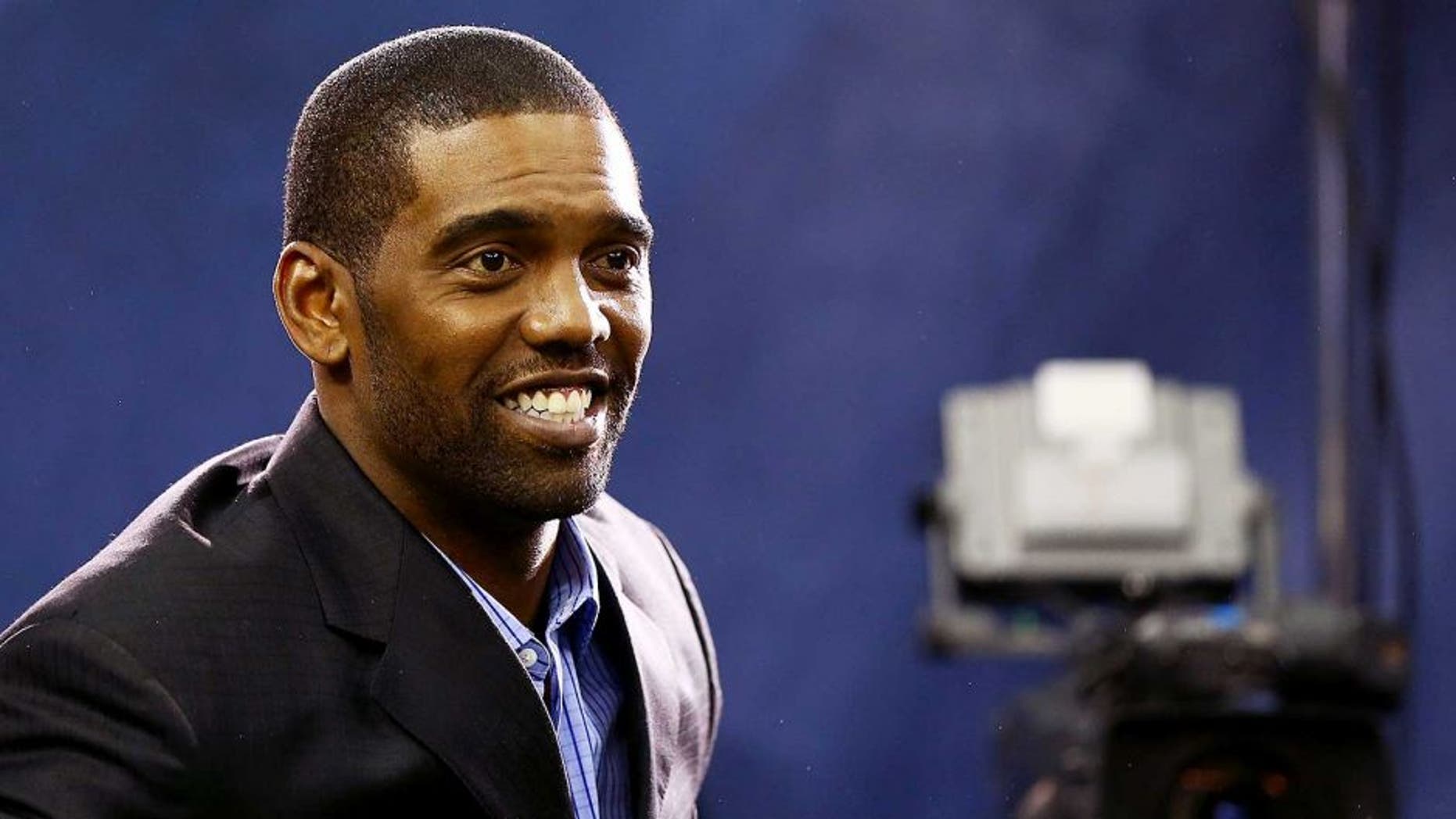 NEWARK, NJ - JANUARY 28: Former NFL player Randy Moss attends Super Bowl XLVIII Media Day at the Prudential Center on January 28, 2014 in Newark, New Jersey. Super Bowl XLVIII will be played between the Seattle Seahawks and the Denver Broncos on February 2. (Photo by Elsa/Getty Images)