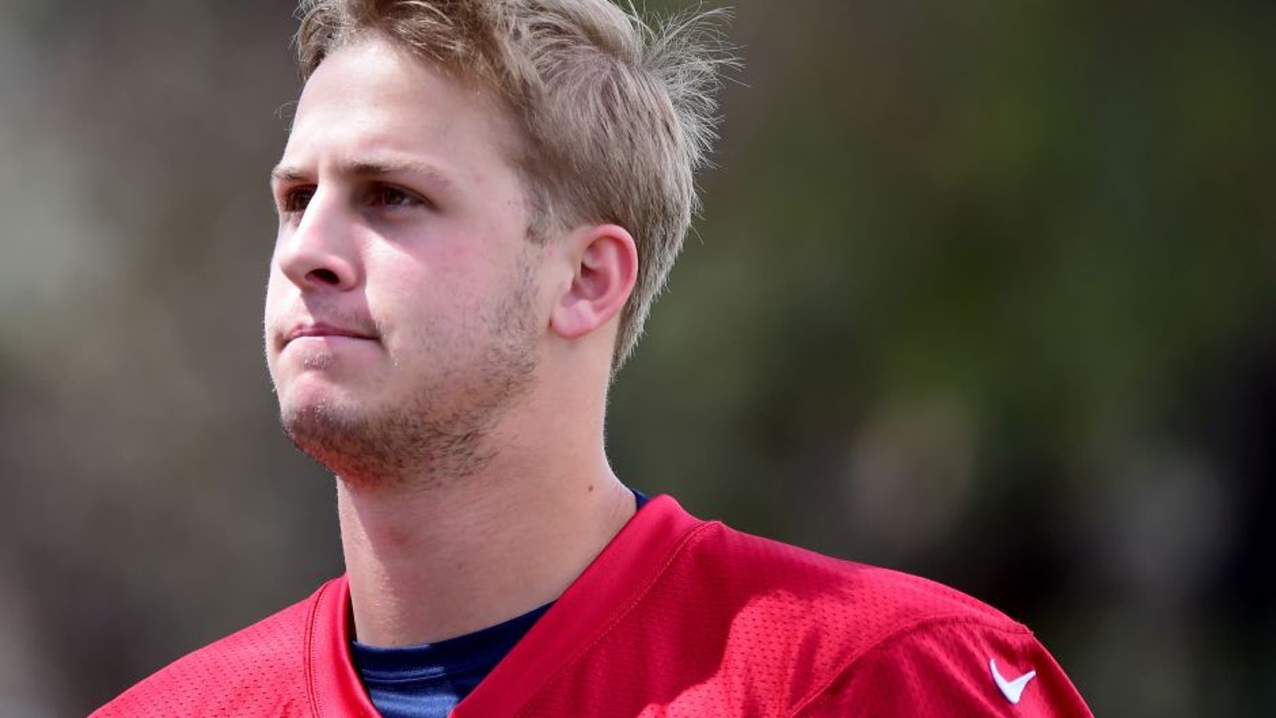 OXNARD, CA - MAY 06: Jared Goff #16 of the Los Angeles Rams comes off the field before the start of a Los Angeles Rams rookie camp on May 06, 2016 in Oxnard, California. (Photo by Harry How/Getty Images)