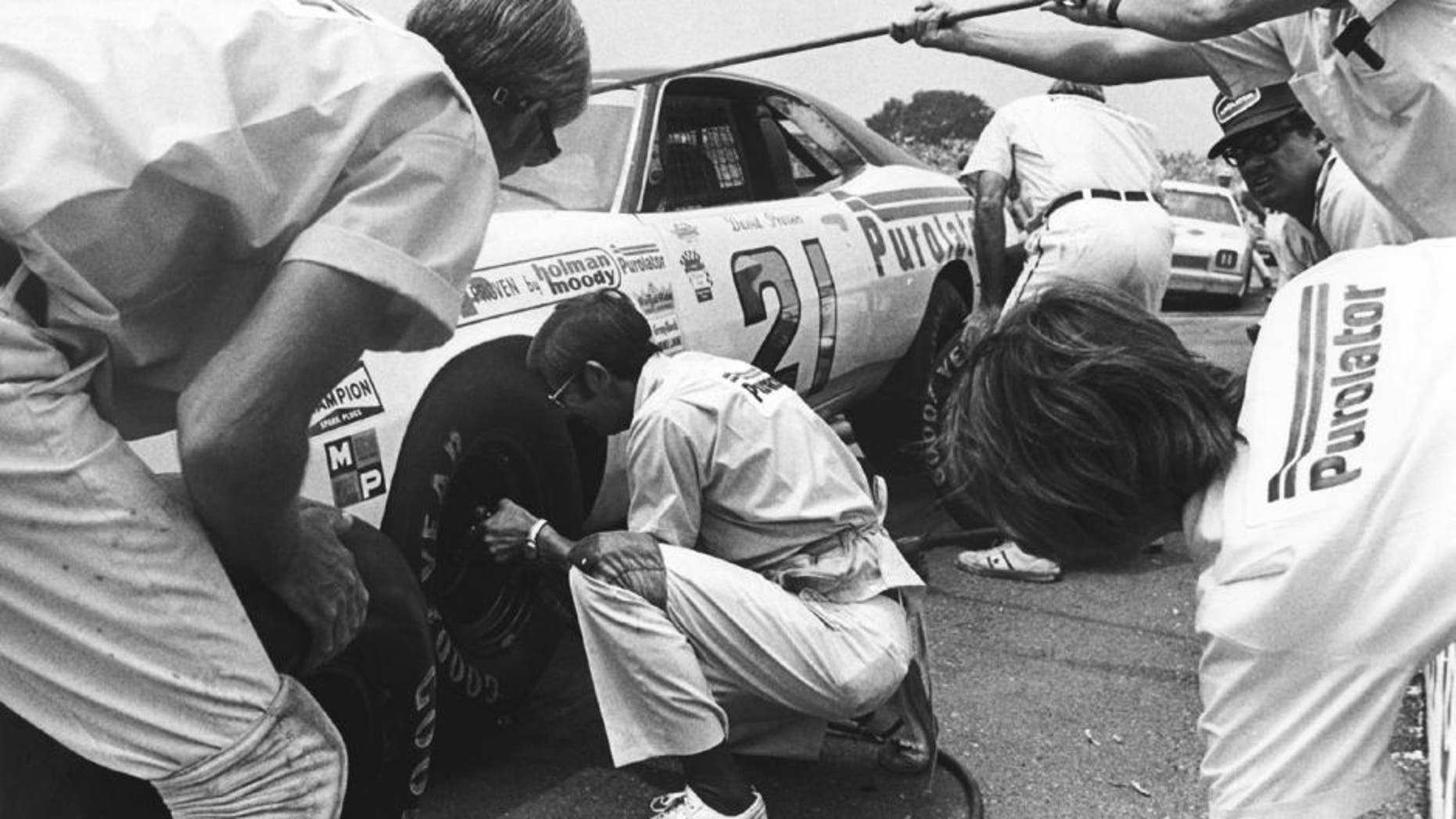 UNKNOWN â 1973: The Wood Brothers pit their car for driver David Pearson during a NASCAR Cup race. The team had an incredible year, winning 11 of the 18 races they entered, and starting from the pole position eight times. (Photo by ISC Images & Archives via Getty Images)
