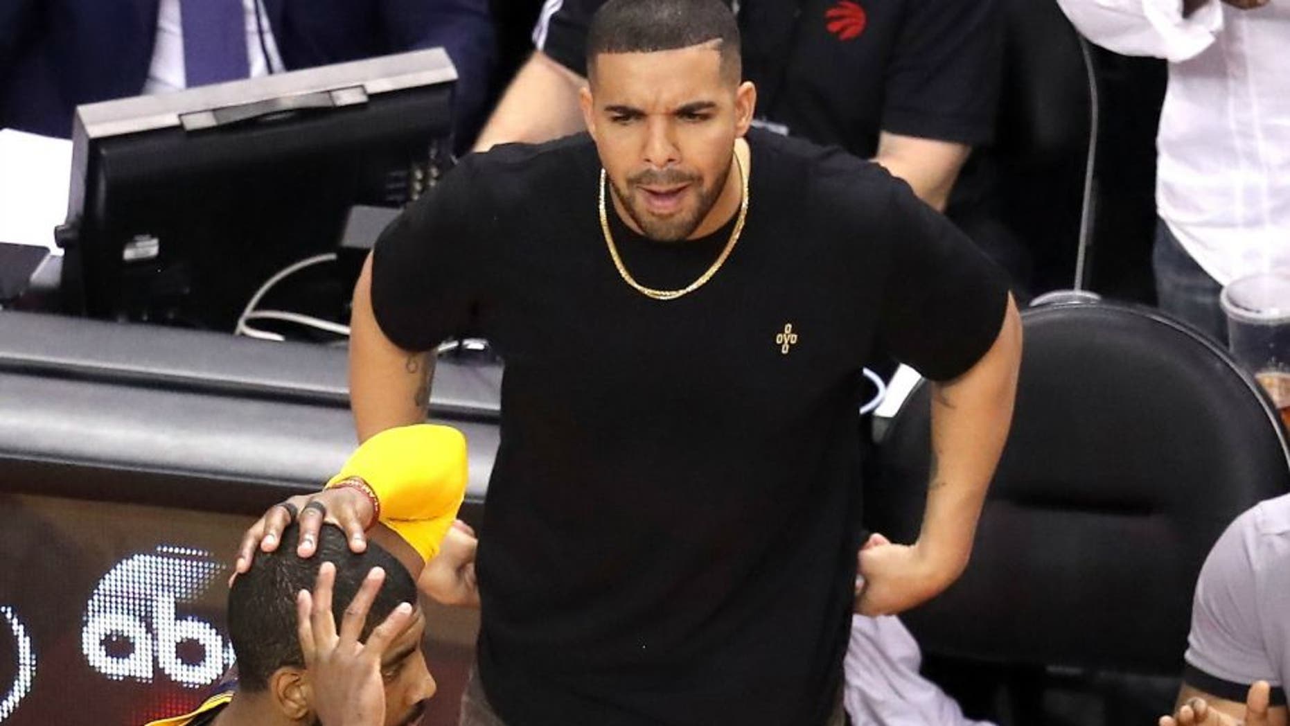 in game four of the Eastern Conference Finals during the 2016 NBA Playoffs at the Air Canada Centre on May 23, 2016 in Toronto, Ontario, Canada. NOTE TO USER: User expressly acknowledges and agrees that, by downloading and or using this photograph, User is consenting to the terms and conditions of the Getty Images License Agreement.