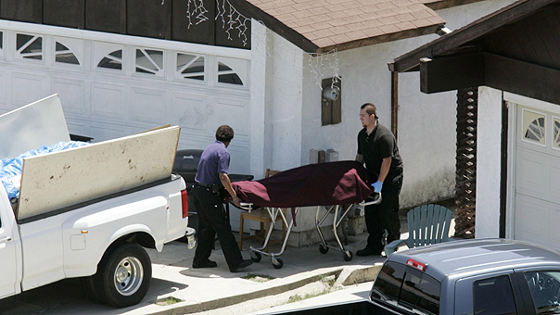 May 24: The body of an apparent drowning victim is removed at a house on the cul-de-sac of Parkcreek Court at North Bay Terraces, in San Diego.