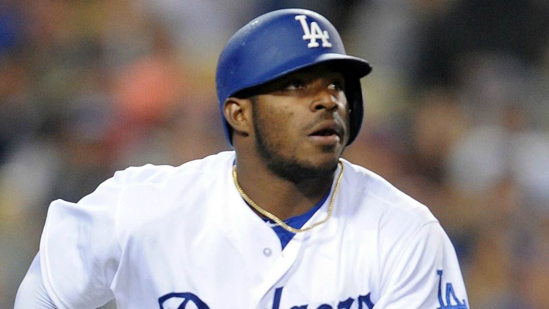 May 13, 2016; Los Angeles, CA, USA; Los Angeles Dodgers right fielder Yasiel Puig (66) runs after hitting a solo home run in the sixth inning against St. Louis Cardinals at Dodger Stadium. Mandatory Credit: Gary A. Vasquez-USA TODAY Sports