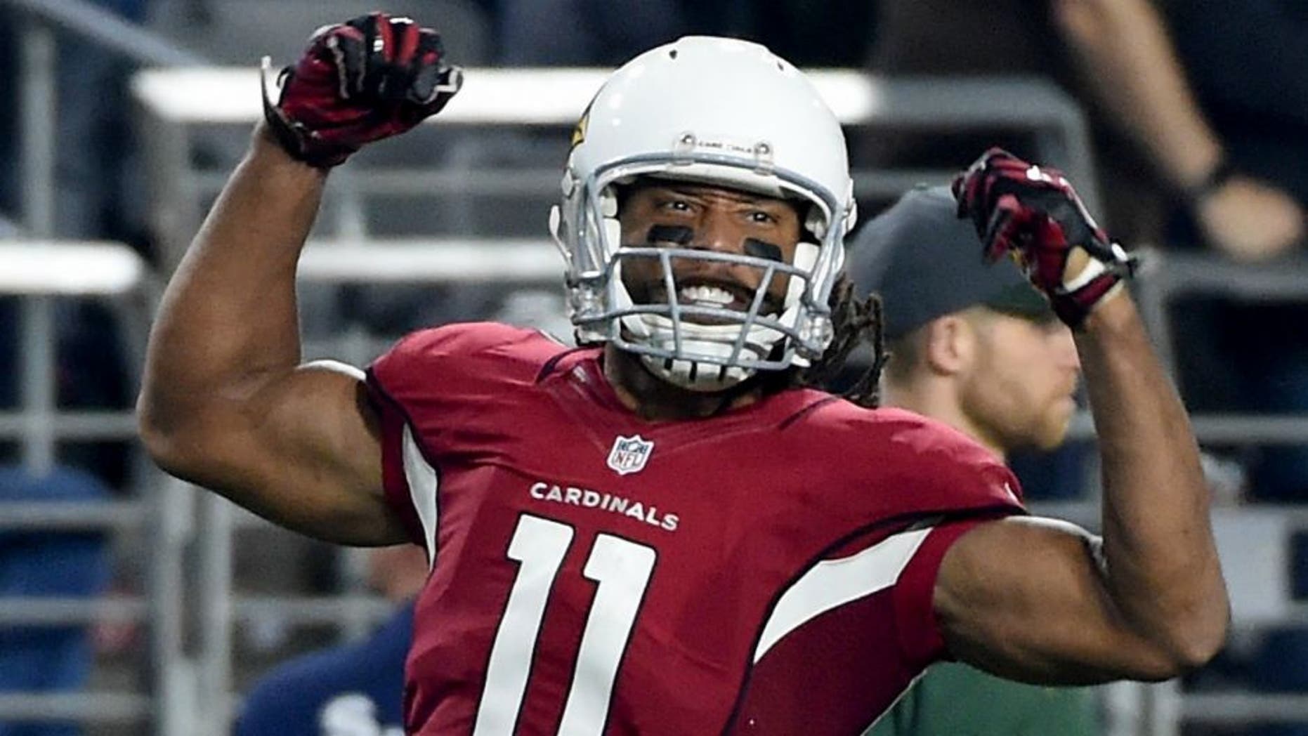 in the NFC Divisional Playoff Game at University of Phoenix Stadium on January 16, 2016 in Glendale, Arizona.,GLENDALE, AZ - JANUARY 16: Wide receiver Larry Fitzgerald #11 of the Arizona Cardinals reacts after making a catch during the third quarter of the NFC Divisional Playoff Game at University of Phoenix Stadium on January 16, 2016 in Glendale, Arizona. (Photo by Norm Hall/Getty Images)
