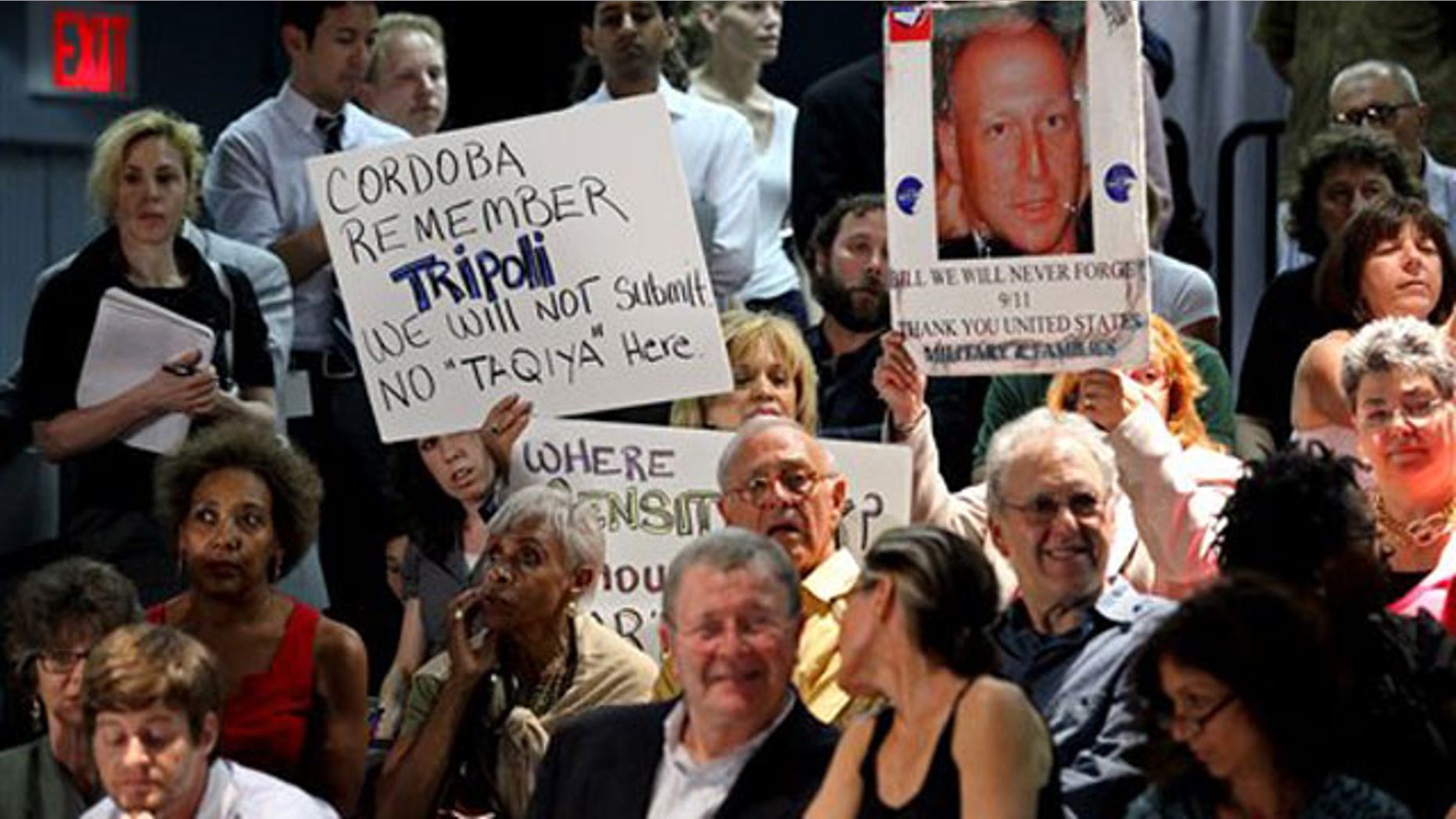May 25: Community members both for and against the plan to build a mosque and cultural center near Ground Zero in Lower Manhattan speak during board meeting.