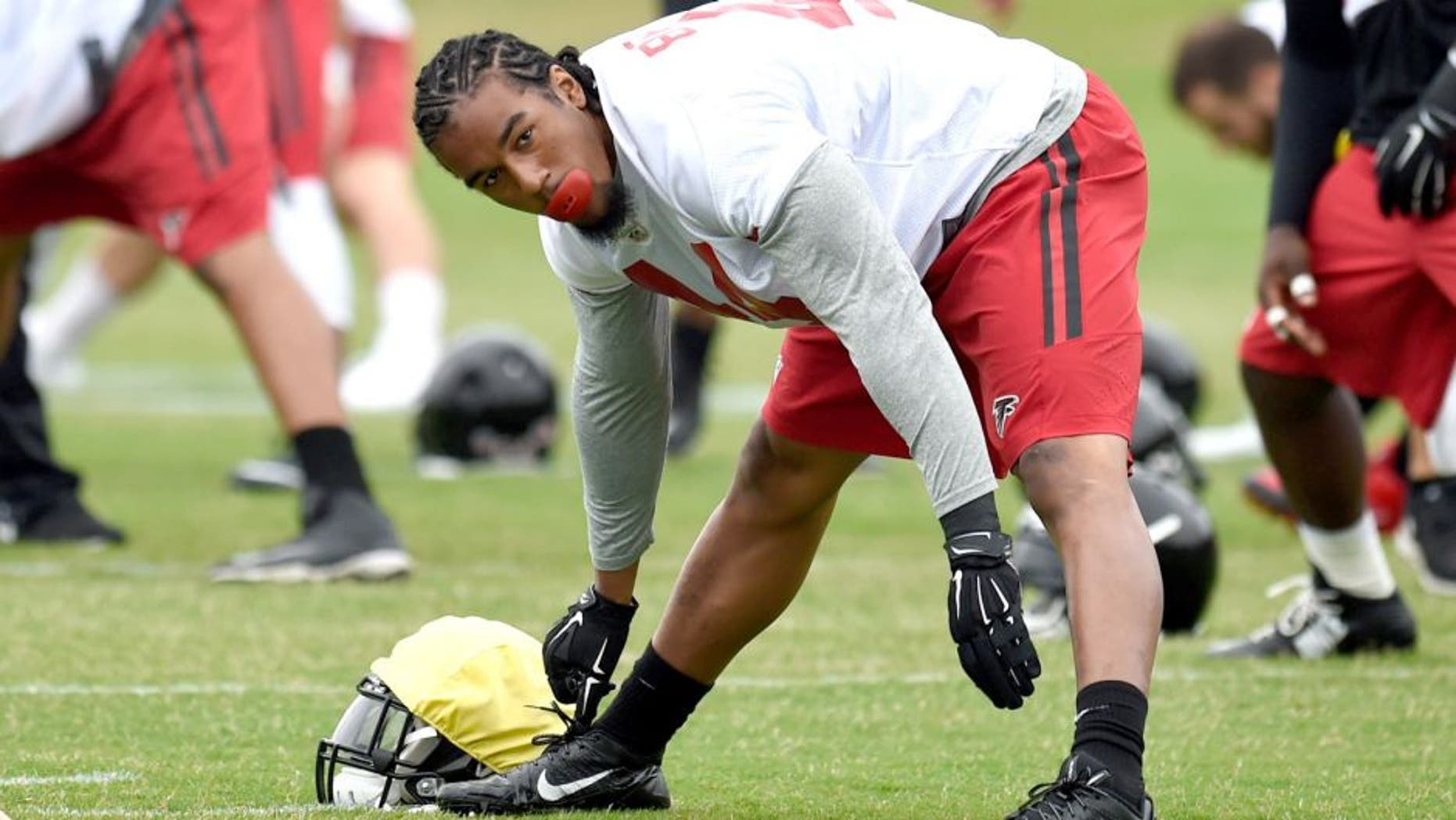 May 26, 2015; Atlanta, GA, USA; Atlanta Falcons linebacker Vic Beasley (44) warms up on the field during OTA at Falcons Training Facility. Mandatory Credit: Dale Zanine-USA TODAY Sports