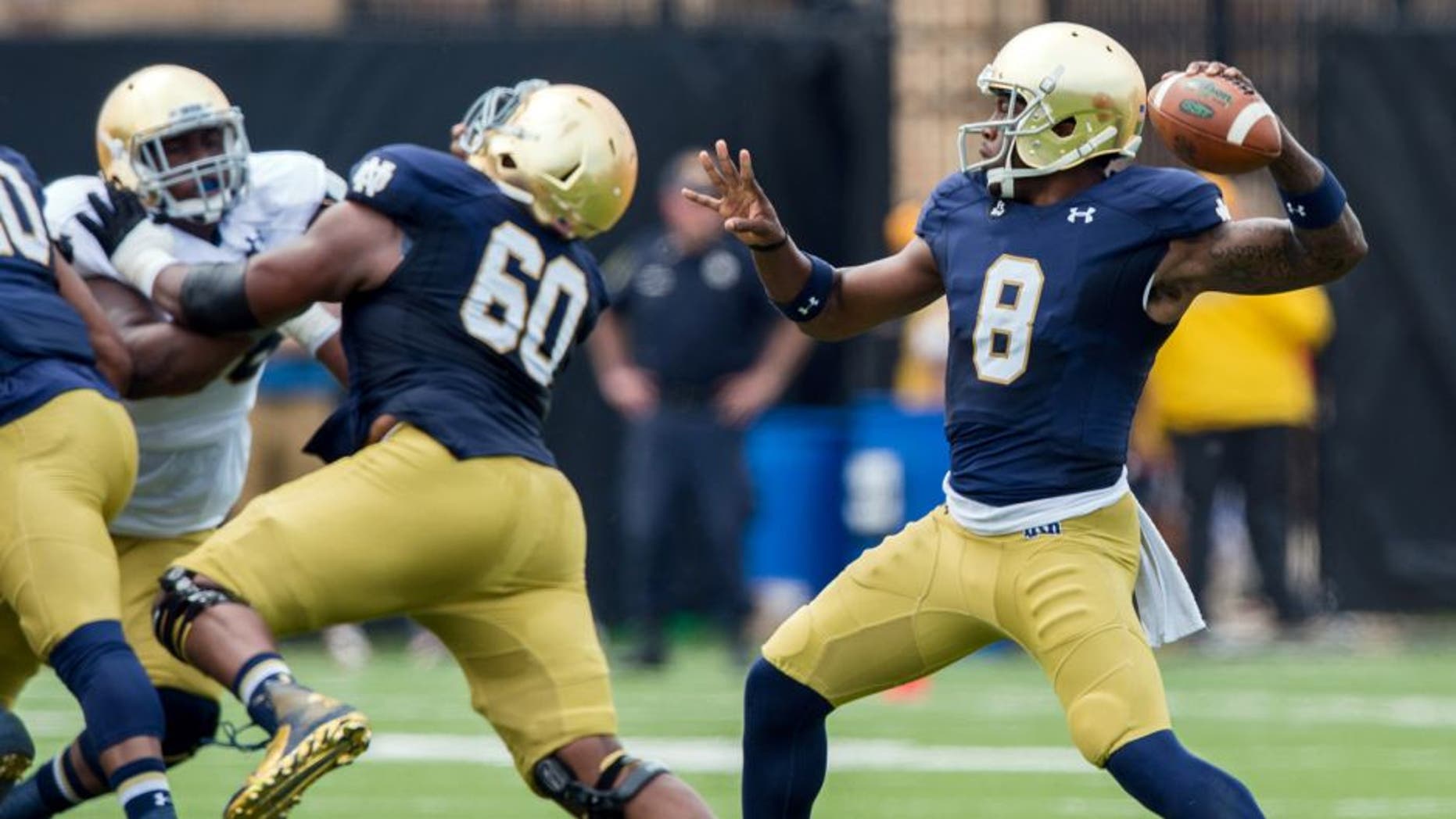 Apr 18, 2015; Notre Dame, IN, USA; Notre Dame Fighting Irish quarterback Malik Zaire (8) throws in the first quarter of the Blue-Gold Game at the LaBar Practice Complex. Mandatory Credit: Matt Cashore-USA TODAY Sports