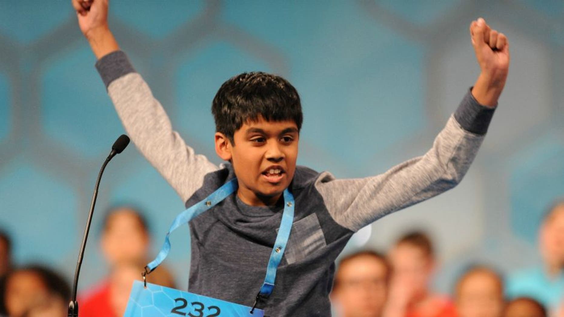 May 26, 2016; National Harbor, MD, USA; Nihar Janga, 11, of Austin, Texas, reacts after correctly spelling 'quillon' in the finals during the 2016 Scripps National Spelling Bee at the Gaylord National Resort and Convention Center. Mandatory Credit: Christopher Powers-USA TODAY NETWORK