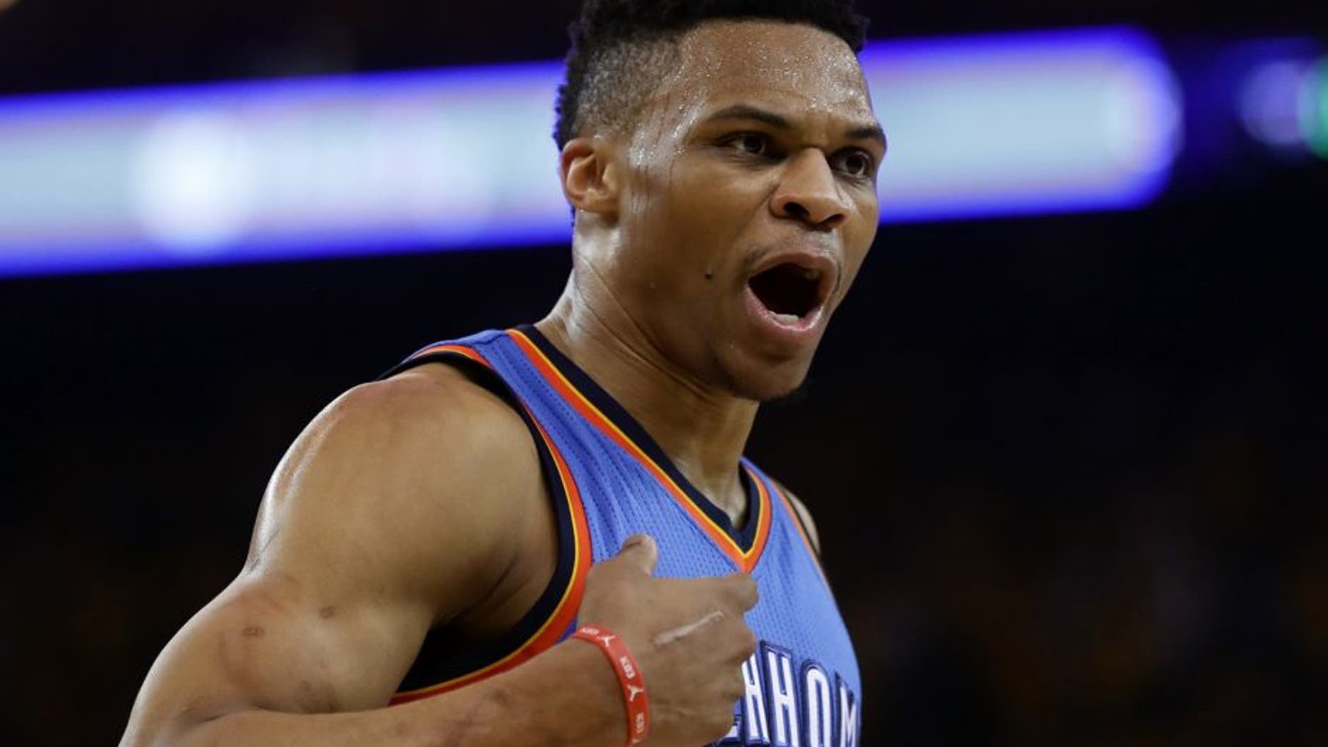 OAKLAND, CA - MAY 26: Russell Westbrook #0 of the Oklahoma City Thunder reacts to a play against the Golden State Warriors during Game Five of the Western Conference Finals during the 2016 NBA Playoffs at ORACLE Arena on May 26, 2016 in Oakland, California. (Photo by Ezra Shaw/Getty Images)