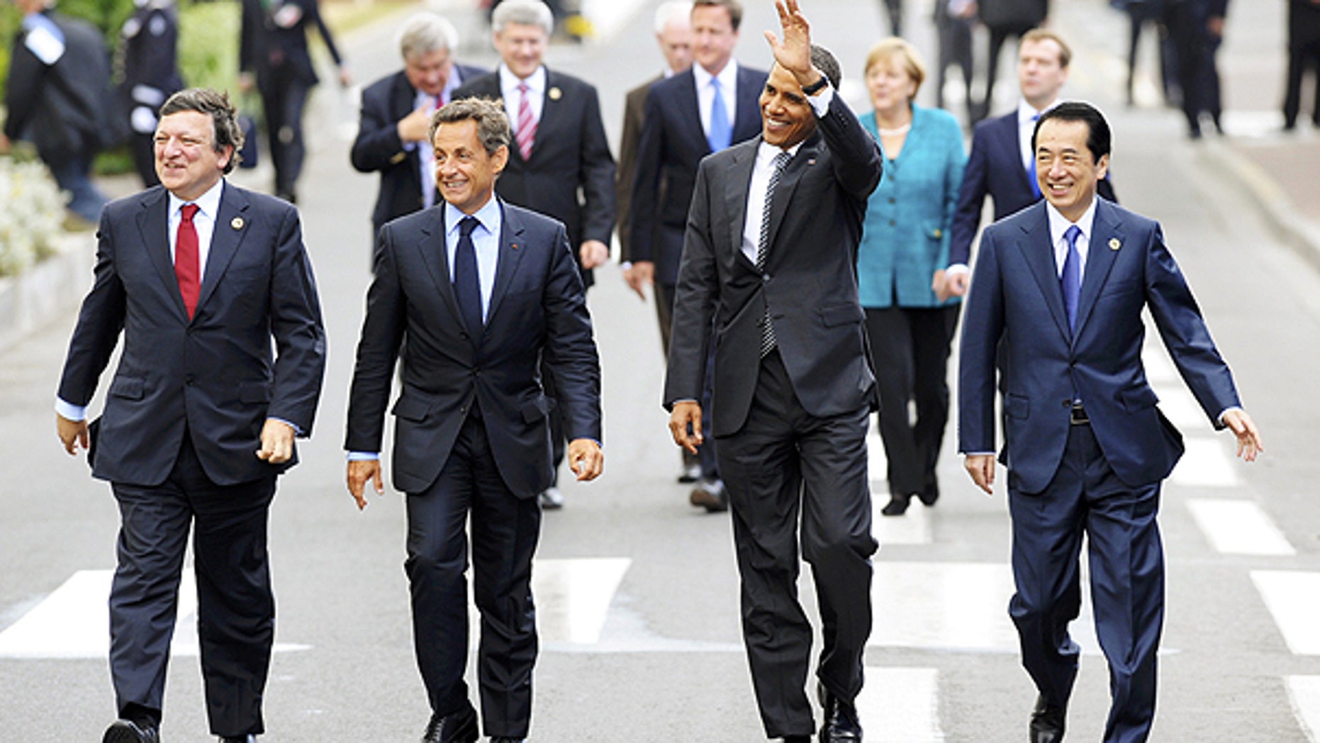 May 26: From left, European Commission President Jose Manuel Barroso, French President Nicolas Sarkozy, US President Barack Obama and Japanese Prime Minister Naoto Kan walk after a lunch meeting at the G8 summit in Deauville, France.