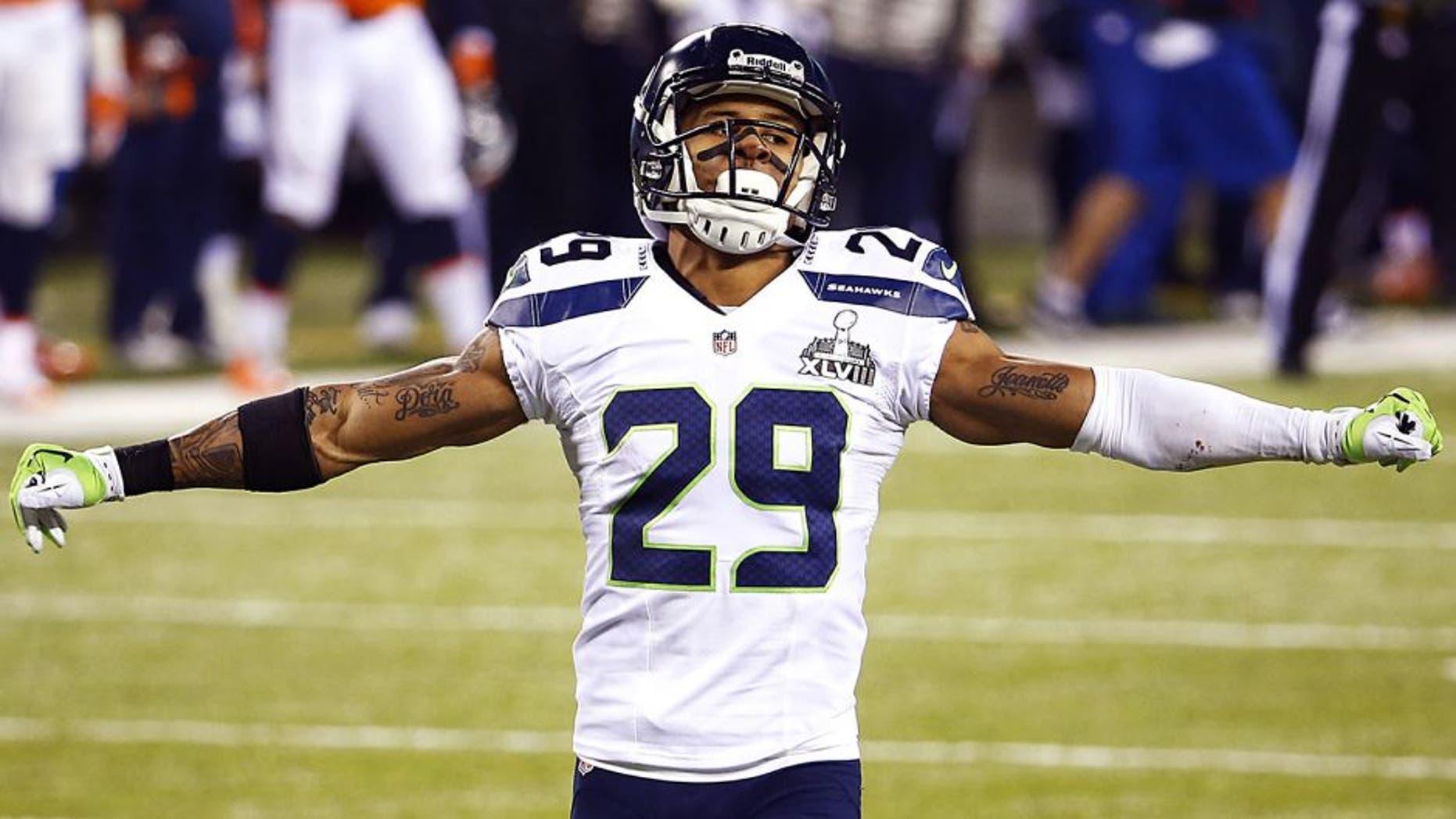 EAST RUTHERFORD, NJ - FEBRUARY 02: Free safety Earl Thomas #29 of the Seattle Seahawks gestures during the second quarter Super Bowl XLVIII at MetLife Stadium on February 2, 2014 in East Rutherford, New Jersey. (Photo by Tom Pennington/Getty Images)