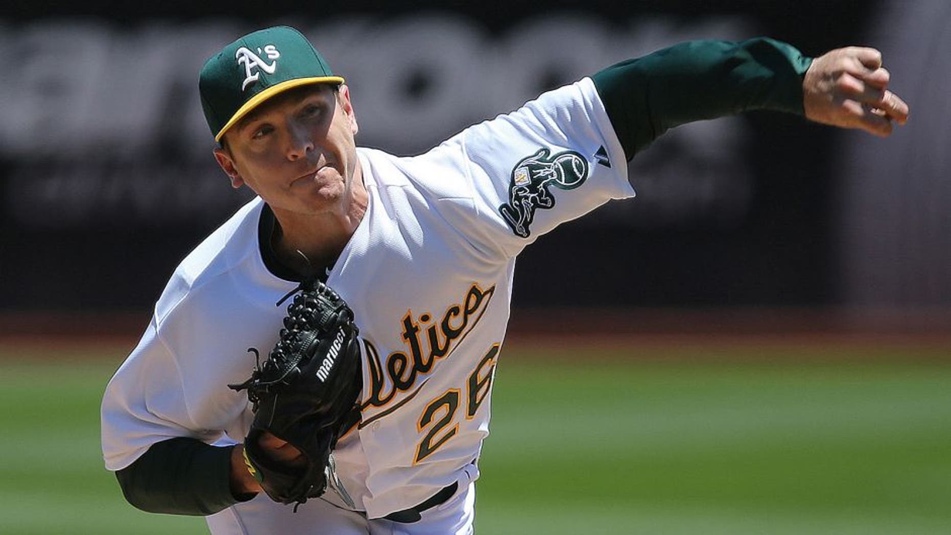 May 27, 2015; Oakland, CA, USA; Oakland Athletics starting pitcher Scott Kazmir (26) pitches the ball against the Detroit Tigers during the second inning at O.co Coliseum. Mandatory Credit: Kelley L Cox-USA TODAY Sports