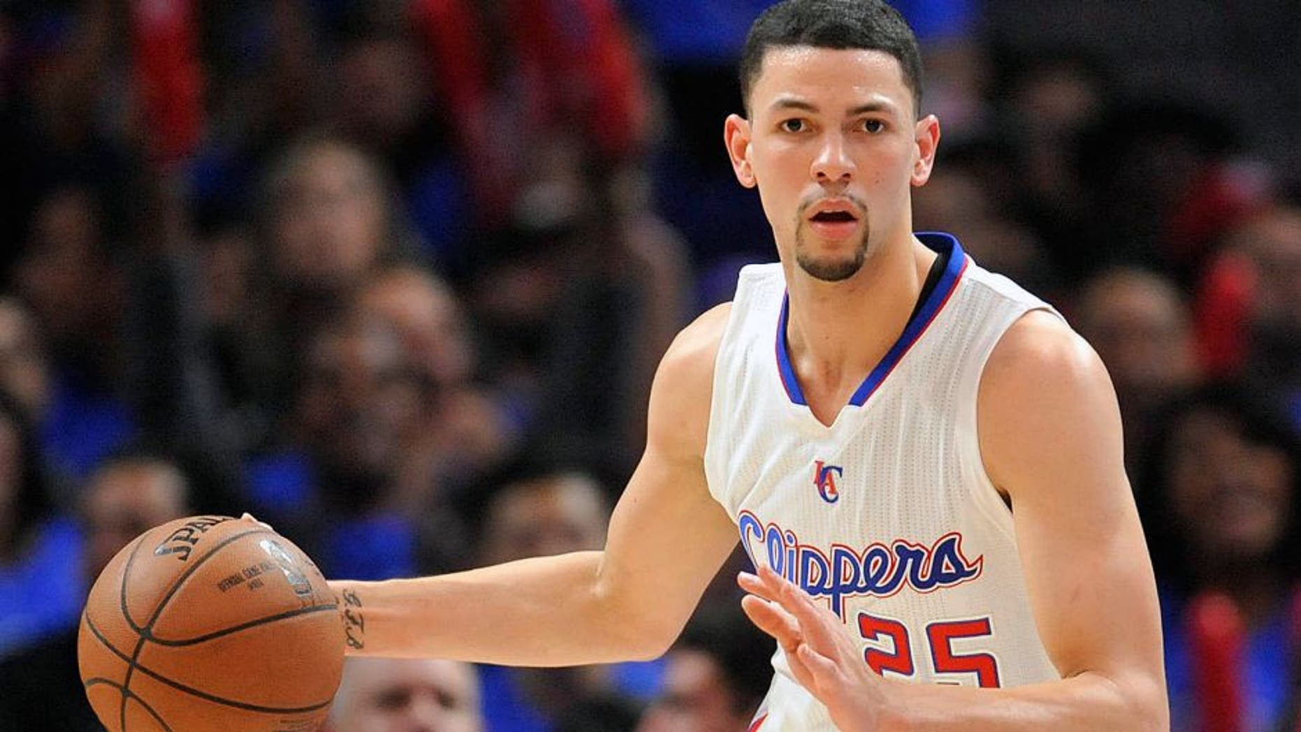 May 8, 2015; Los Angeles, CA, USA; Los Angeles Clippers guard Austin Rivers (25) controls the ball against the Houston Rockets during the second half in game three of the second round of the NBA Playoffs. at Staples Center. Mandatory Credit: Gary A. Vasquez-USA TODAY Sports