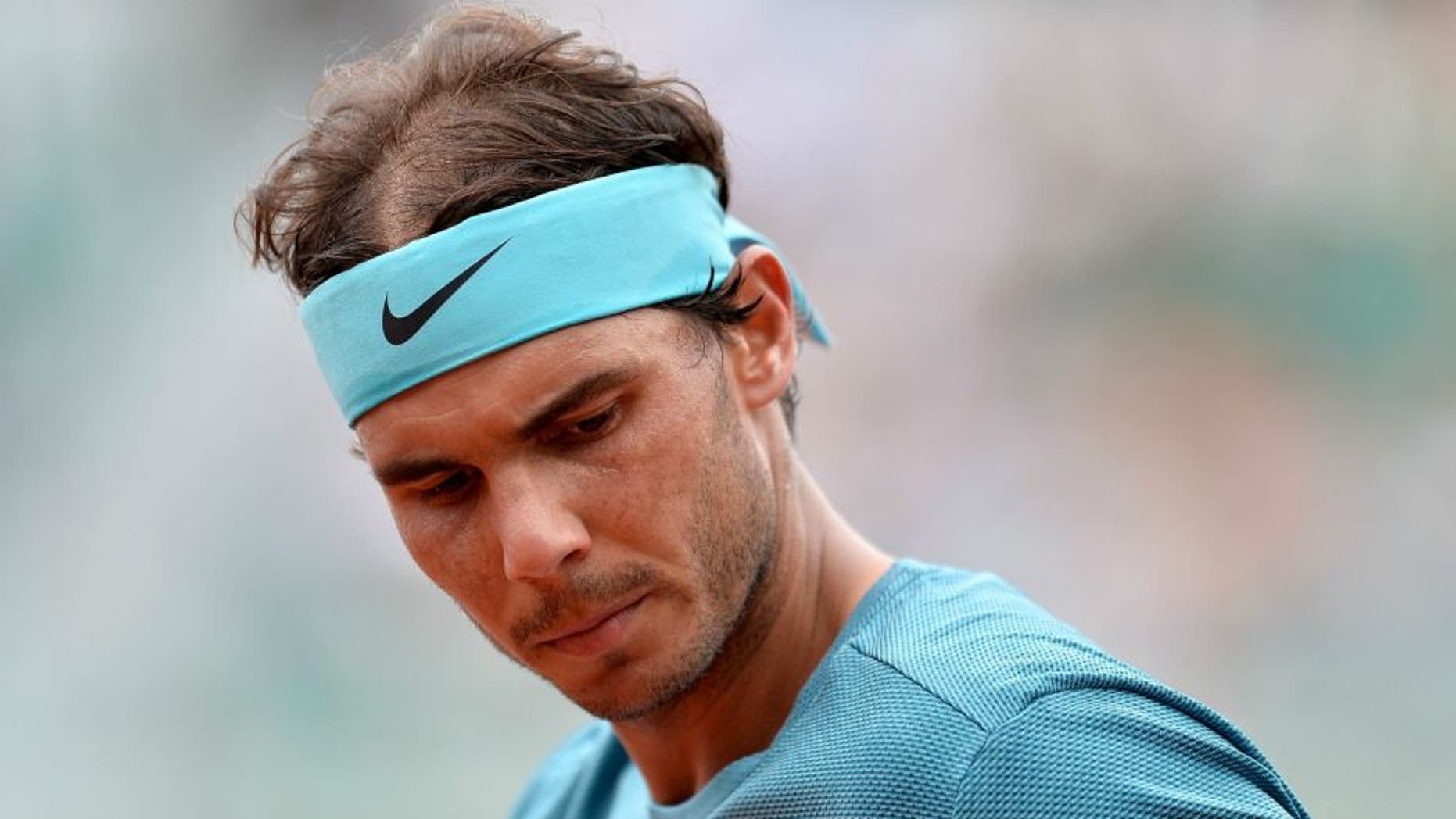 PARIS, FRANCE - MAY 26: Rafael Nadal of Spain reacts during his men's single second round match against Facundo Bagnis of Argentina on day five of the 2016 French Open at Roland Garros on May 26, 2016 in Paris, France. (Photo by Aurelien Meunier/Getty Images)
