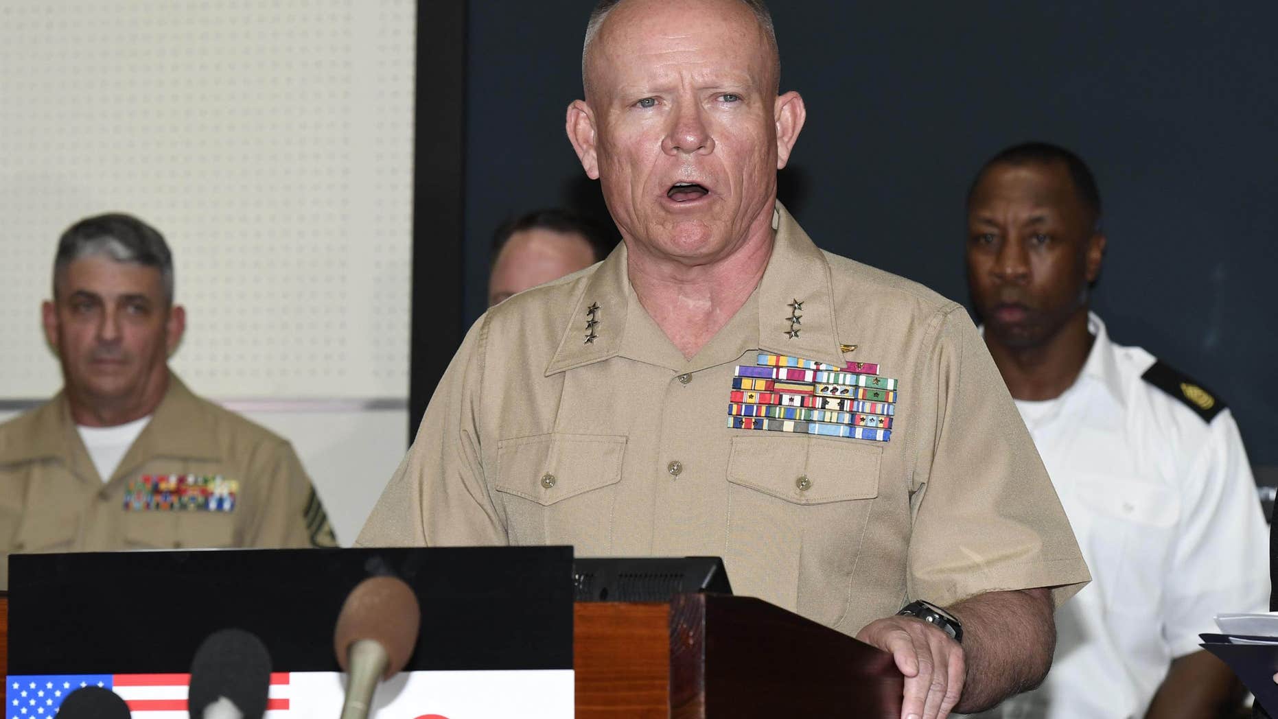 Lt. Gen. Lawrence D. Nicholson, U.S. Marine Corps Commanding General of III Marine Expeditionary Force, speaks during a press conference at the USMC Camp Foster in Okinawa, Japan after a former Marine was arrested on suspicion of killing a woman on the southern Japanese island.