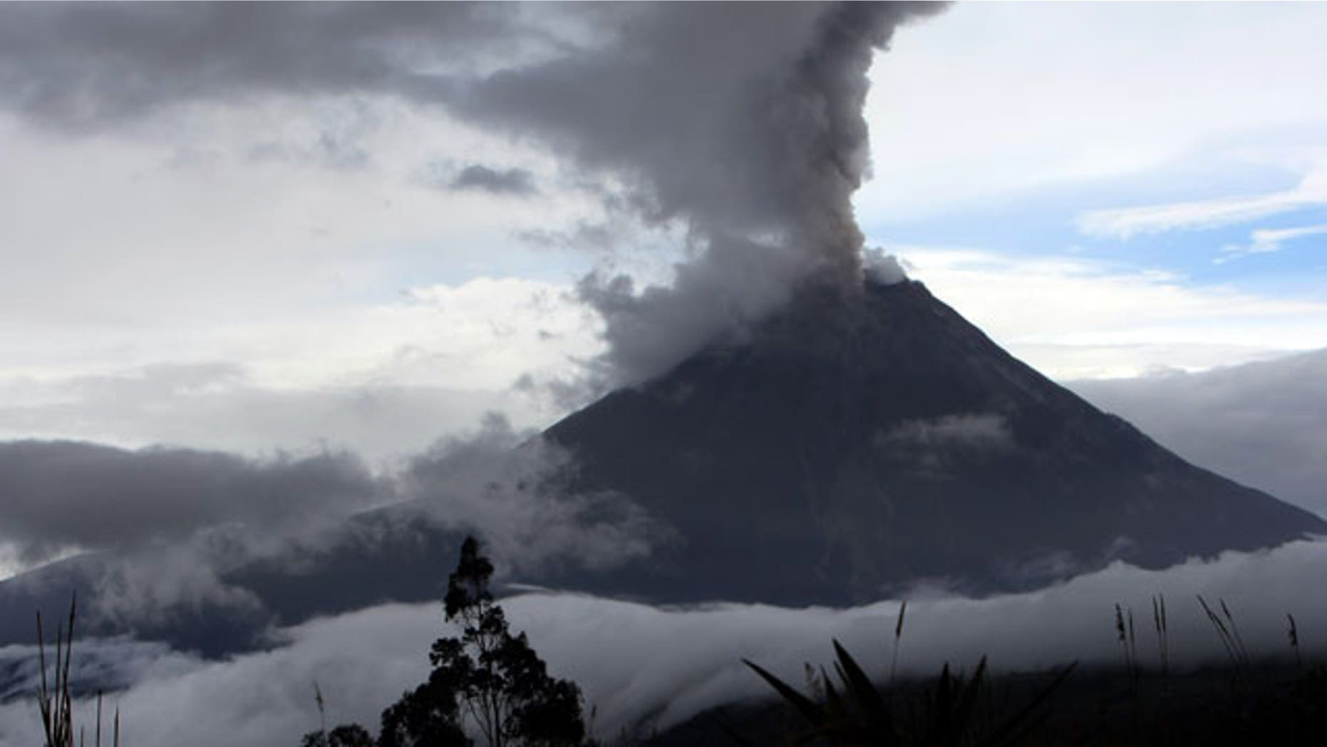 May 28: A view of the Tungurahua volcano throwing ashes in Huambalo, in Ecuador's central highlands.
