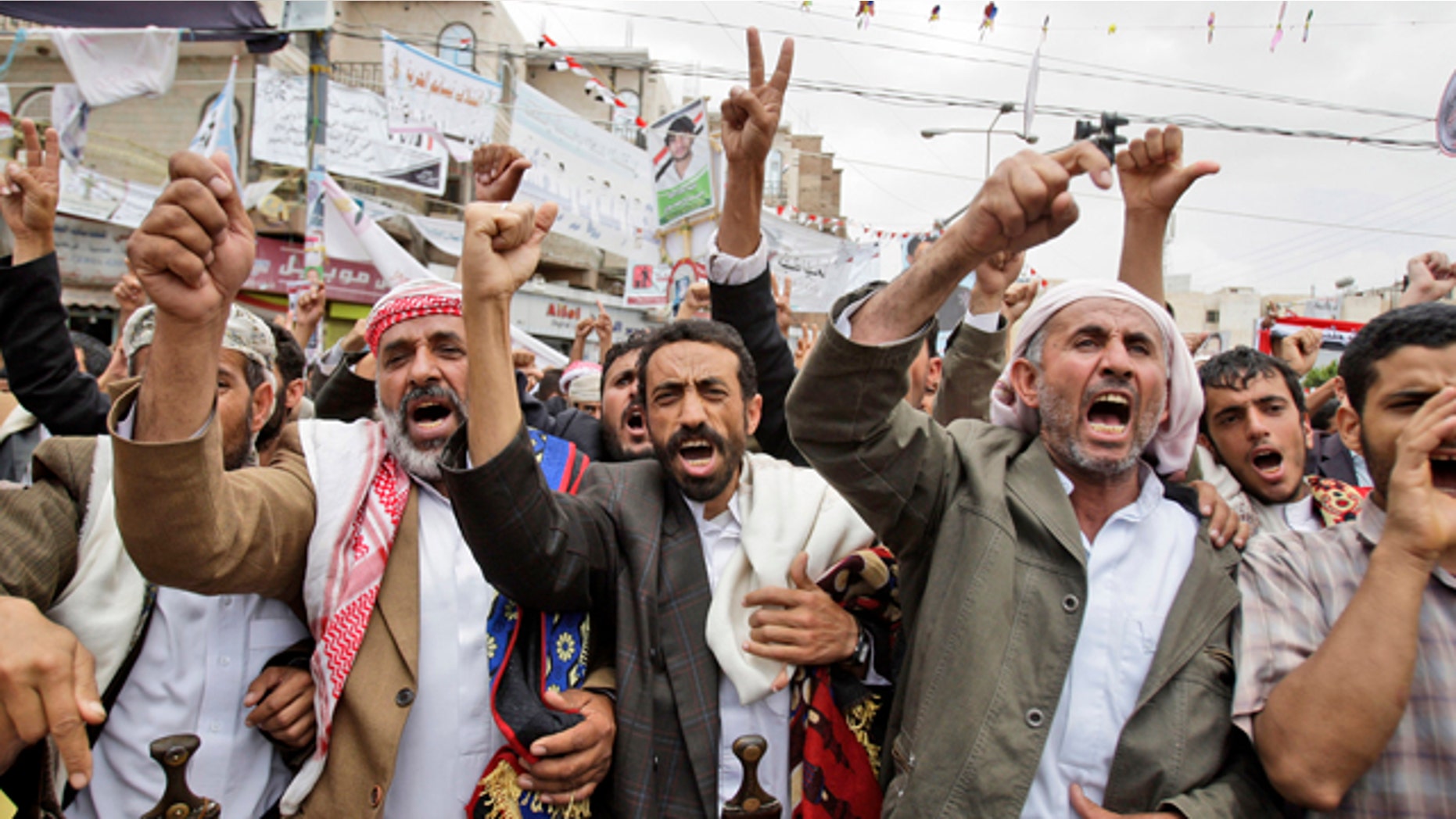 May 28: Anti-government protestors shout slogans during a demonstration demanding the resignation of Yemeni President Ali Abdullah Saleh in Sanaa, Yemen.