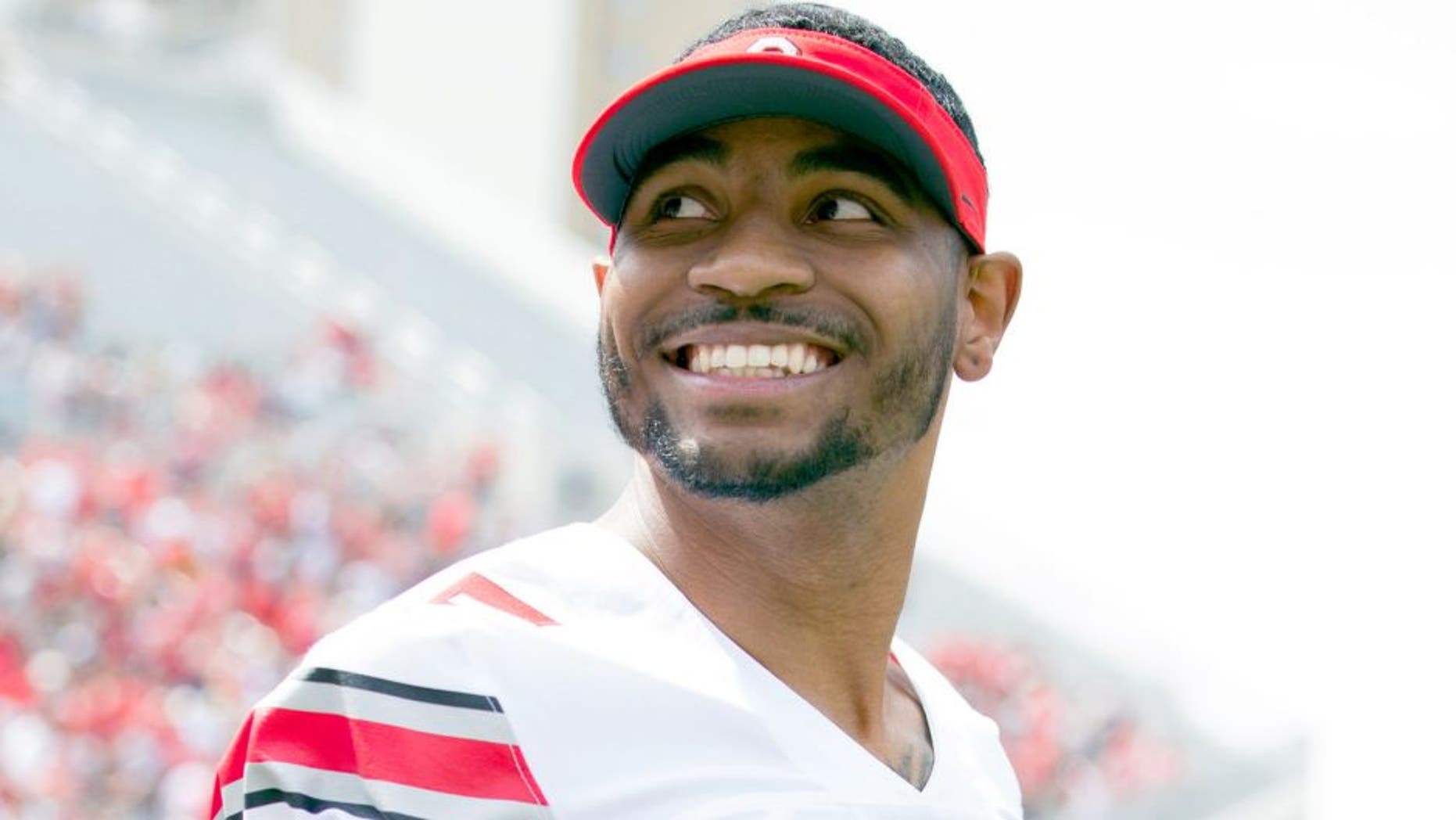 Apr 18, 2015; Columbus, OH, USA; Ohio State Gray Team quarterback Braxton Miller (5) reacts to the fans during the Ohio Spring Game at Ohio Stadium. Mandatory Credit: Greg Bartram-USA TODAY Sports