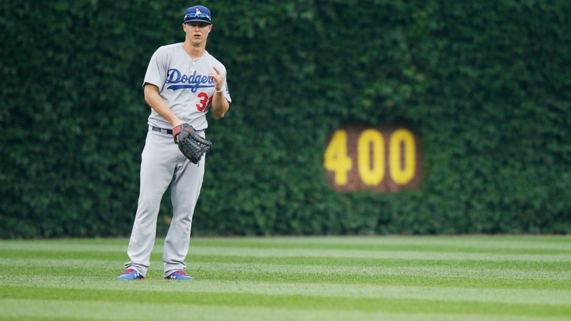 CHICAGO, IL - JUNE 25: Joc Pederson #31 of the Los Angeles Dodgers stands ready in the outfield during the game against the Chicago Cubs at Wrigley Field on June 25, 2015 in Chicago, Illinois. The Dodgers defeated the Cubs 4-0. (Photo by Joe Robbins/Getty Images)