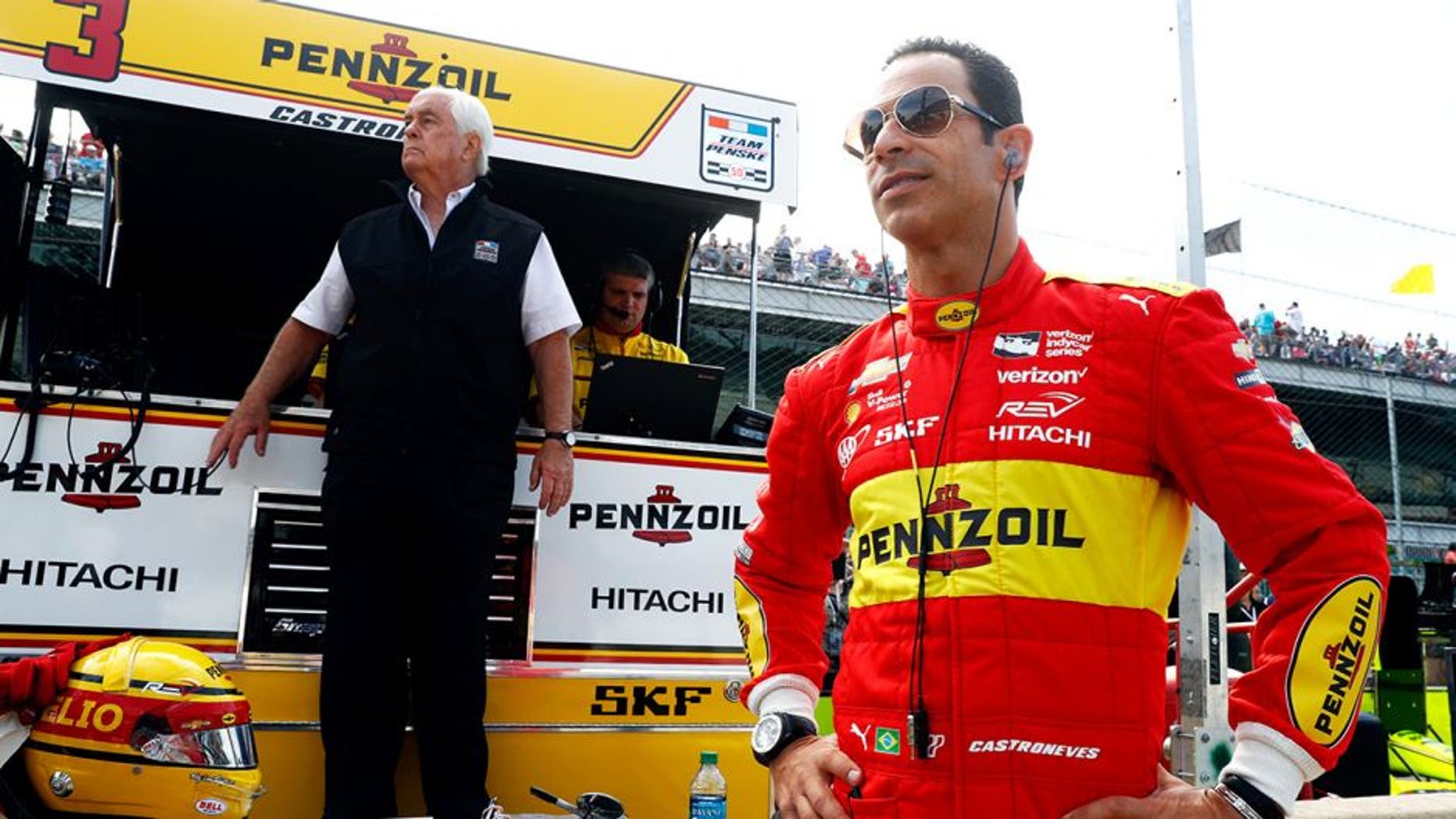 INDIANAPOLIS, IN - MAY 27: Helio Castroneves #3 of Brazil watches alongside owner Roger Penske during Carb Day ahead of the 100th running of the Indianapolis 500 at Indianapolis Motorspeedway on May 27, 2016 in Indianapolis, Indiana. (Photo by Jamie Squire/Getty Images)