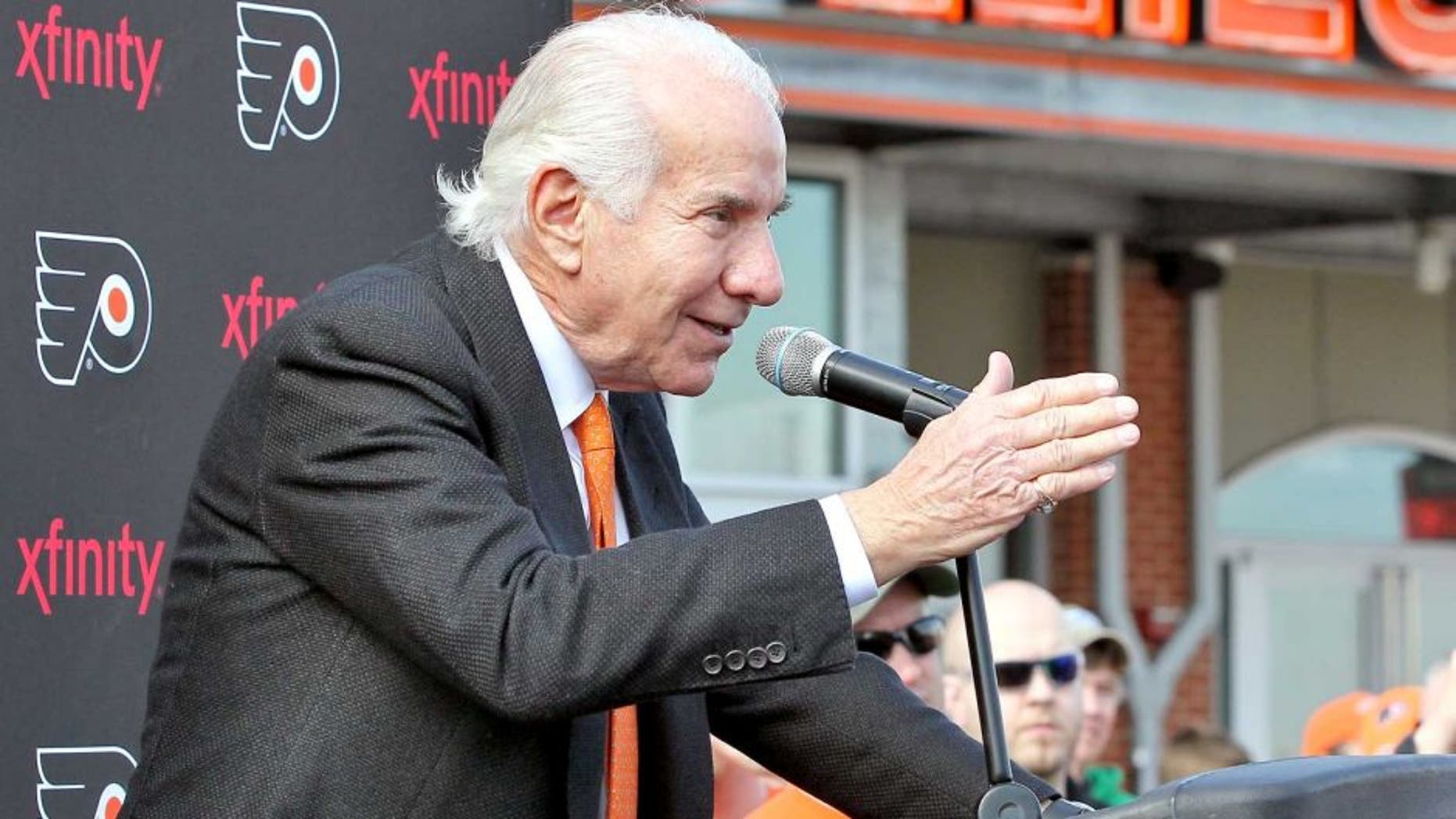 PHILADELPHIA, PA - MARCH 15: Philadelphia Flyers Chairman Ed Snider speaks at the unveiling of a statue of Hockey Hall-of-Famer Fred Shero at Xfinity Live outside of the Wells Fargo Center on March 15, 2014 in Philadelphia, Pennsylvania. The Flyers would go on to defeat the Penguins 4-0. (Photo by Len Redkoles/NHLI via Getty Images) *** Local Caption *** Ed Snider;Fred Shero