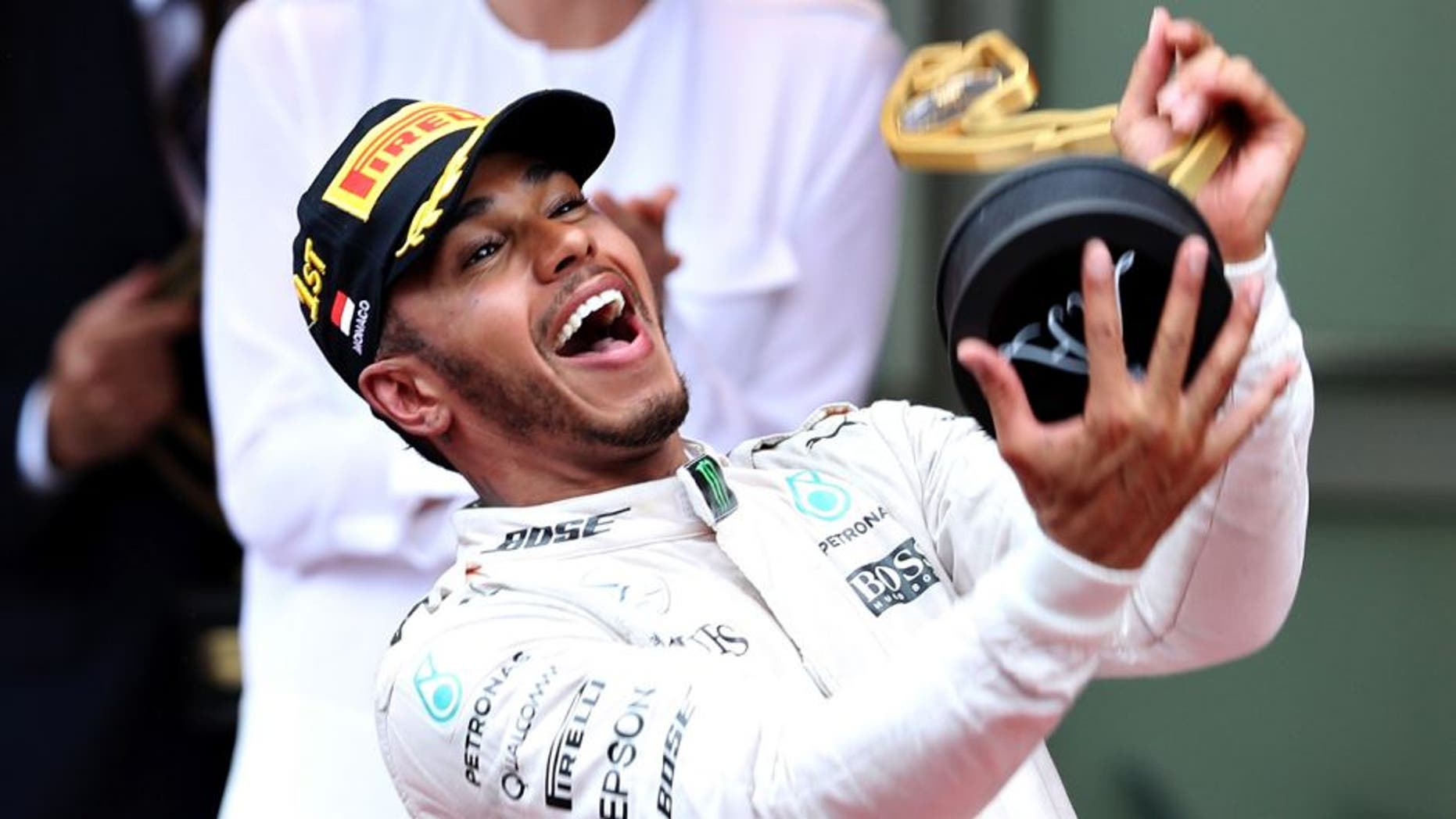 MONTE-CARLO, MONACO - MAY 29: Lewis Hamilton of Great Britain and Mercedes GP celebrates his win on the podium during the Monaco Formula One Grand Prix at Circuit de Monaco on May 29, 2016 in Monte-Carlo, Monaco. (Photo by Mark Thompson/Getty Images)