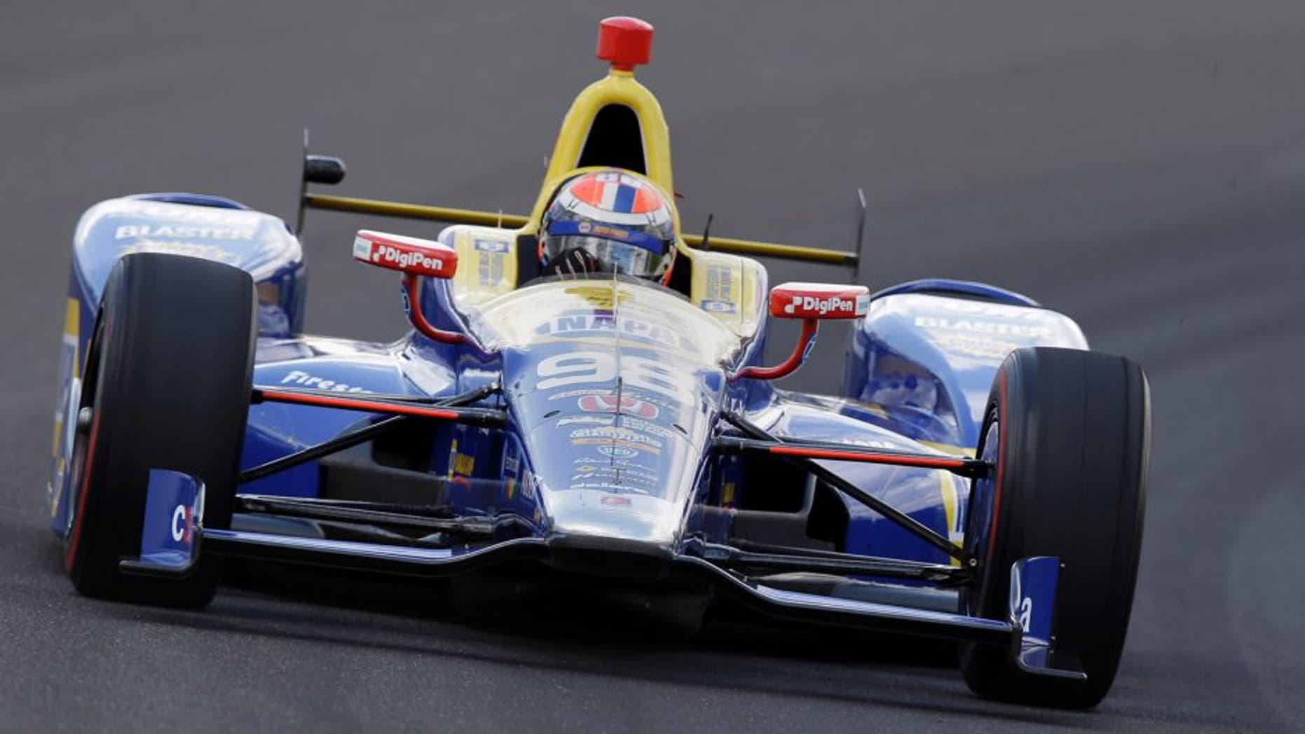 Alexander Rossi drives the the first turn during a practice session on the opening day of qualifications for the Indianapolis 500 auto race at Indianapolis Motor Speedway in Indianapolis, Saturday, May 21, 2016. (AP Photo/Michael Conroy)