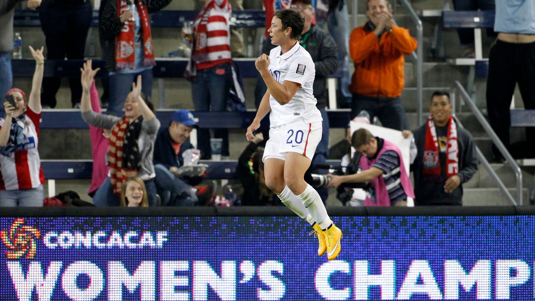 Abby Wambach celebrates her goal against Trinidad and Tobago in this Oct. 15, 2014, file photo.