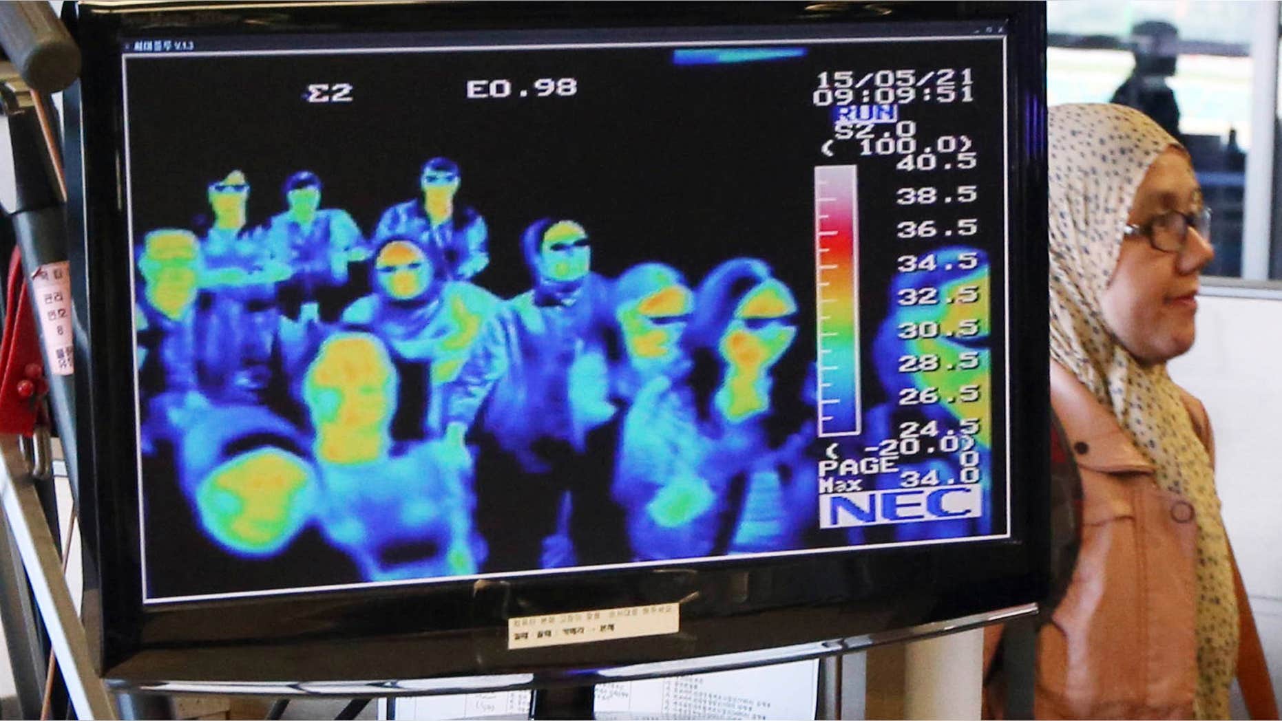 May 21, 2015: A thermal camera monitor shows the body temperature of passengers arriving from overseas against possible MERS, Middle East Respiratory Syndrome, virus at the Incheon International Airport in Incheon, South Korea.