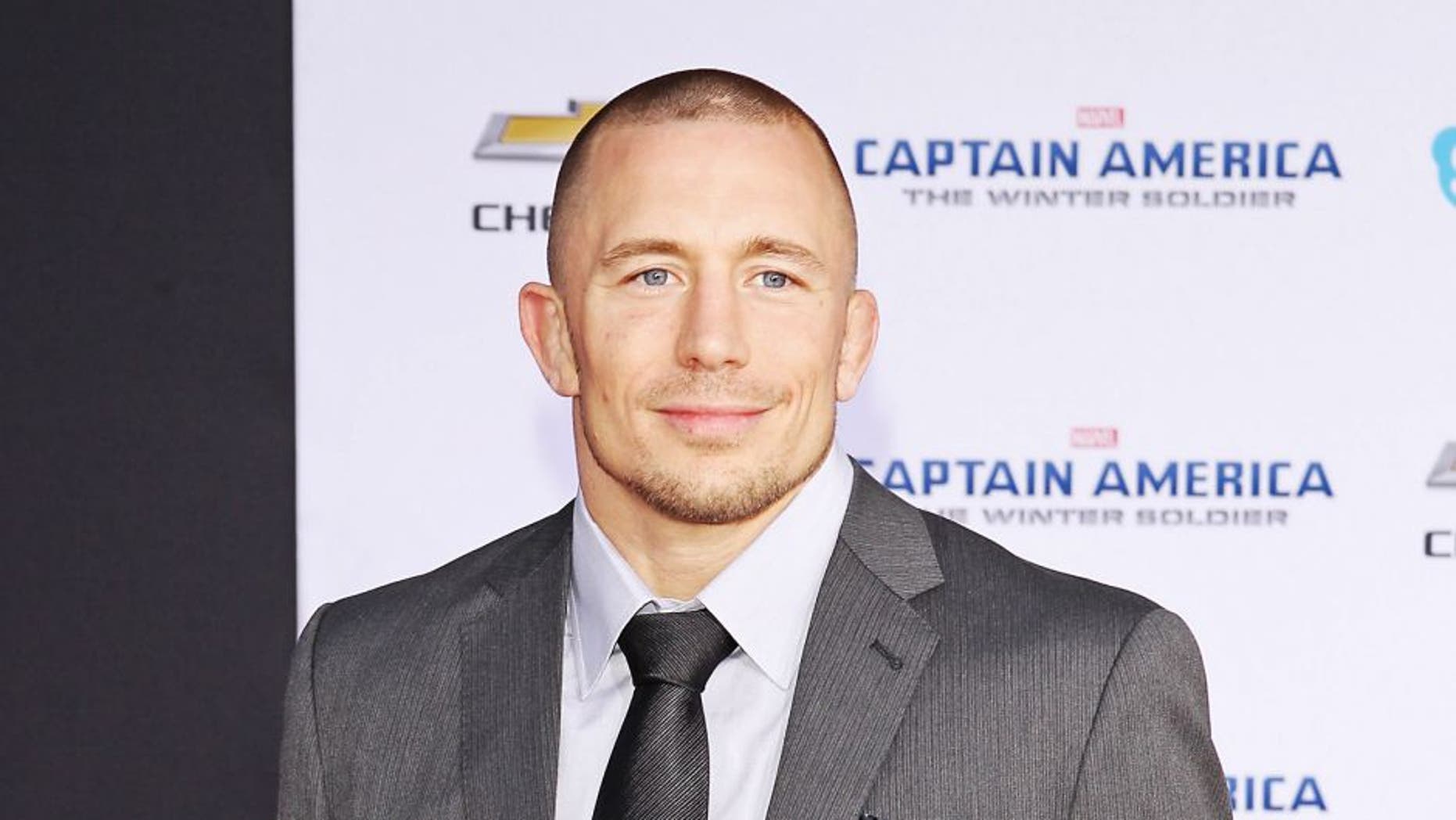HOLLYWOOD, CA - MARCH 13: Georges St-Pierre arrives at the Los Angeles premiere of "Captain America: The Winter Soldier" held at the El Capitan Theatre on March 13, 2014 in Hollywood, California. (Photo by Michael Tran/FilmMagic)
