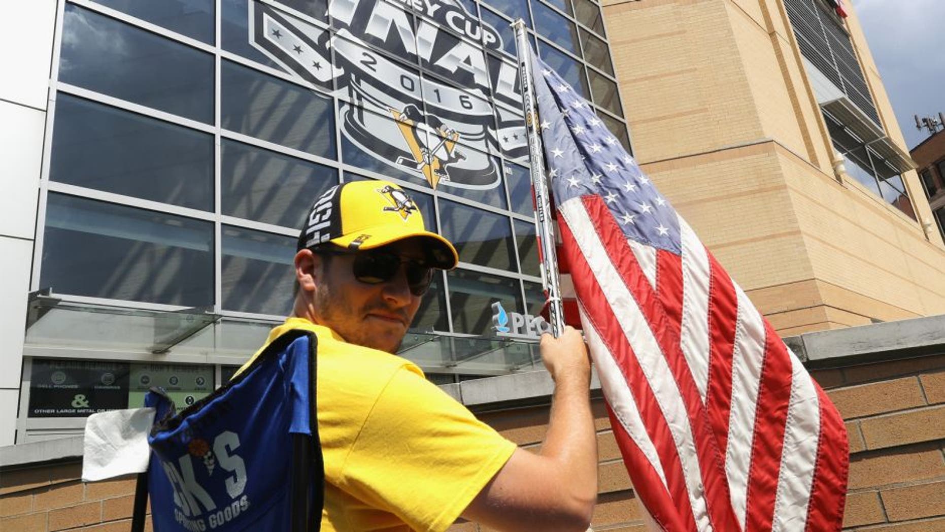 Pittsburgh Penguins fan Nick Comito of Greensburg, PA poses outside of Consol Energy Center prior to Game One of the 2016 NHL Stanley Cup Final between the Pittsburgh Penguins and the San Jose Sharks on May 30, 2016 in Pittsburgh, Pennsylvania. (Photo by Bruce Bennett/Getty Images)