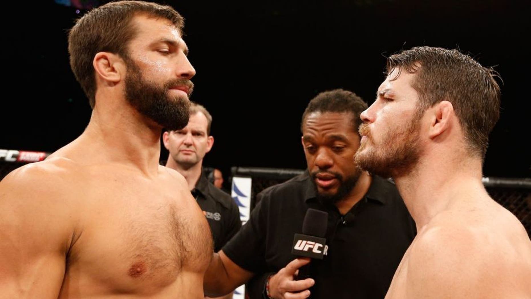 SYDNEY, NSW - NOVEMBER 08: (L-R) Opponents Luke Rockhold of the United States and Michael Bisping of England face off before their middleweight bout during the UFC Fight Night event inside Allphones Arena on November 8, 2014 in Sydney, Australia. (Photo by Josh Hedges/Zuffa LLC/Zuffa LLC via Getty Images)