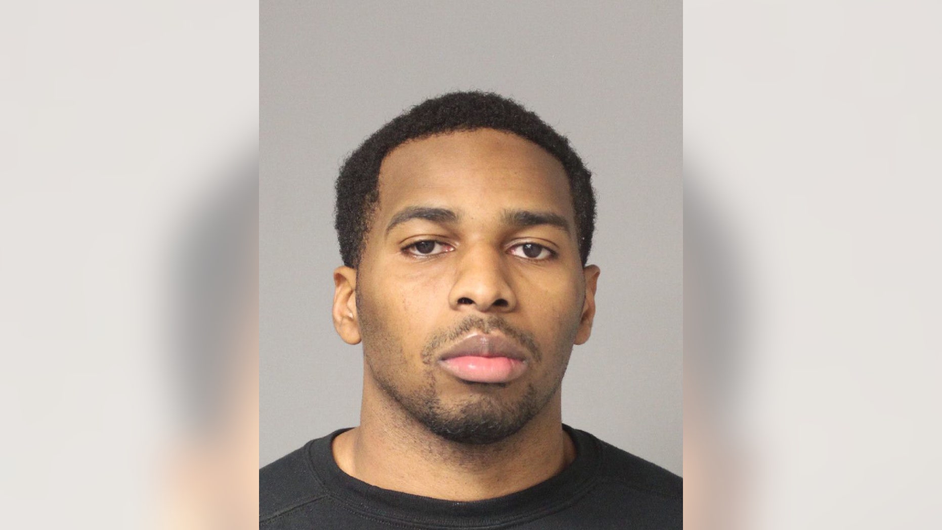 This undated booking photo shows Chukwuemeka Ekwonna. The Washington police officer is facing a string of charges in Maryland after authorities say he paid a 15-year-old girl for sex, then took back the money at gunpoint. Anne Arundel County police said 27-year-old Ekwonna of Glenn Dale was arrested Thursday, April 6, 2017, and charged with armed robbery, assault, third-degree sex offense, reckless endangerment, prostitution and a weapon offense. ( Anne Arundel County Police Department via AP)