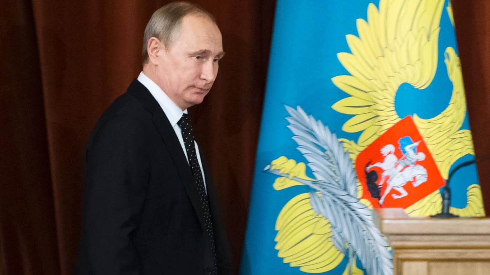 Russian President Vladimir Putin arrives to attend a meeting with Russian Ambassadors in Moscow, Russia, Thursday, June 30, 2016. Putin has warned of lasting fallout from Britain's vote to leave the European Union last week. (AP Photo/Ivan Sekretarev, Pool)