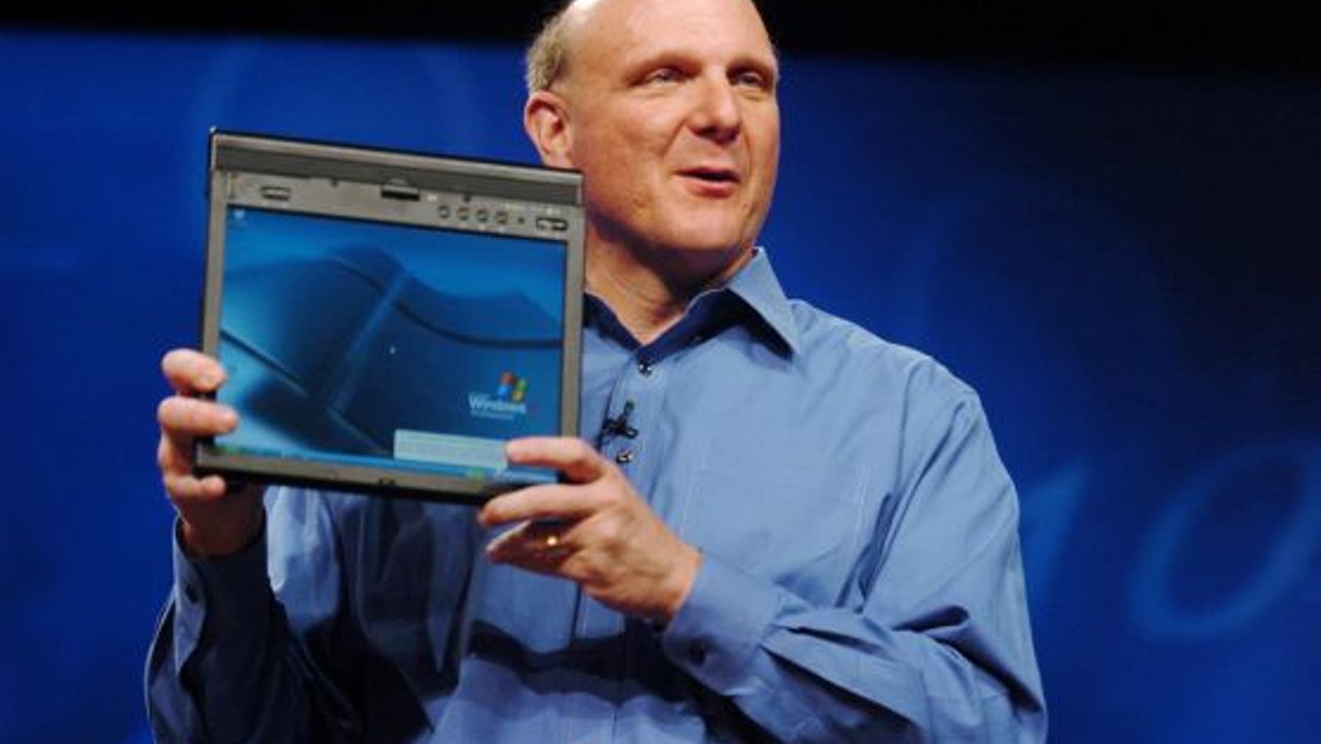 Microsoft CEO Steve Ballmer unveils the new ThinkPad X41 Tablet, a powerful business PC from Lenovo, at Microsoft's TechEd 2005 held Monday June 6, 2005, at the Orange County Convention Center, Orlando, Florida.