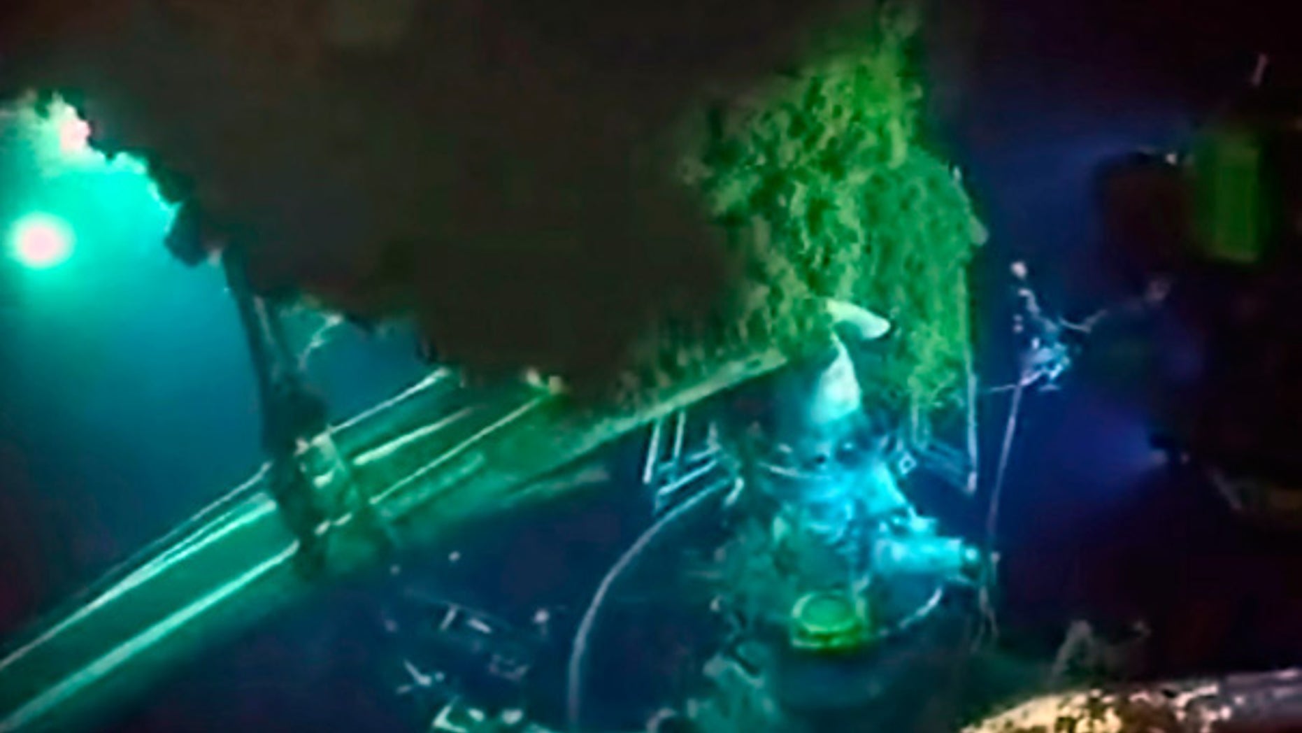 June 2: Underwater robots and other equipment swarm the blowout preventer, bottom left, as oil rises at the site of the Deepwater Horizon spill.