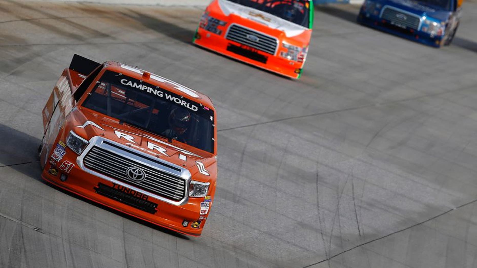 DOVER, DE - MAY 13: Daniel Suarez, driver of the #51 ARRIS Toyota, leads a pack of trucks during the NASCAR Camping World Truck Series JACOB Companies 200 at Dover International Speedway on May 13, 2016 in Dover, Delaware. (Photo by Jeff Zelevansky/NASCAR via Getty Images)