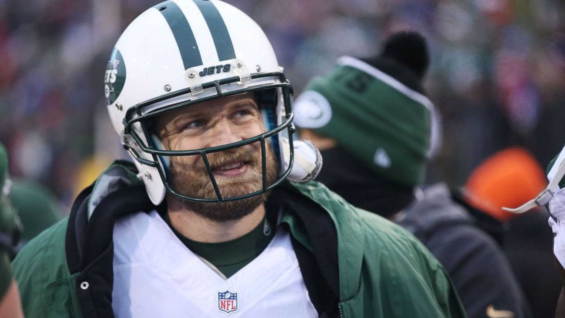 ORCHARD PARK, NY - JANUARY 03: Ryan Fitzpatrick #14 of the New York Jets watches the game against the Buffalo Bills from the sidelines during the second half at Ralph Wilson Stadium on January 3, 2016 in Orchard Park, New York. Buffalo Bills beat the New York Jets 22-17 (Photo by Tom Szczerbowski/Getty Images)